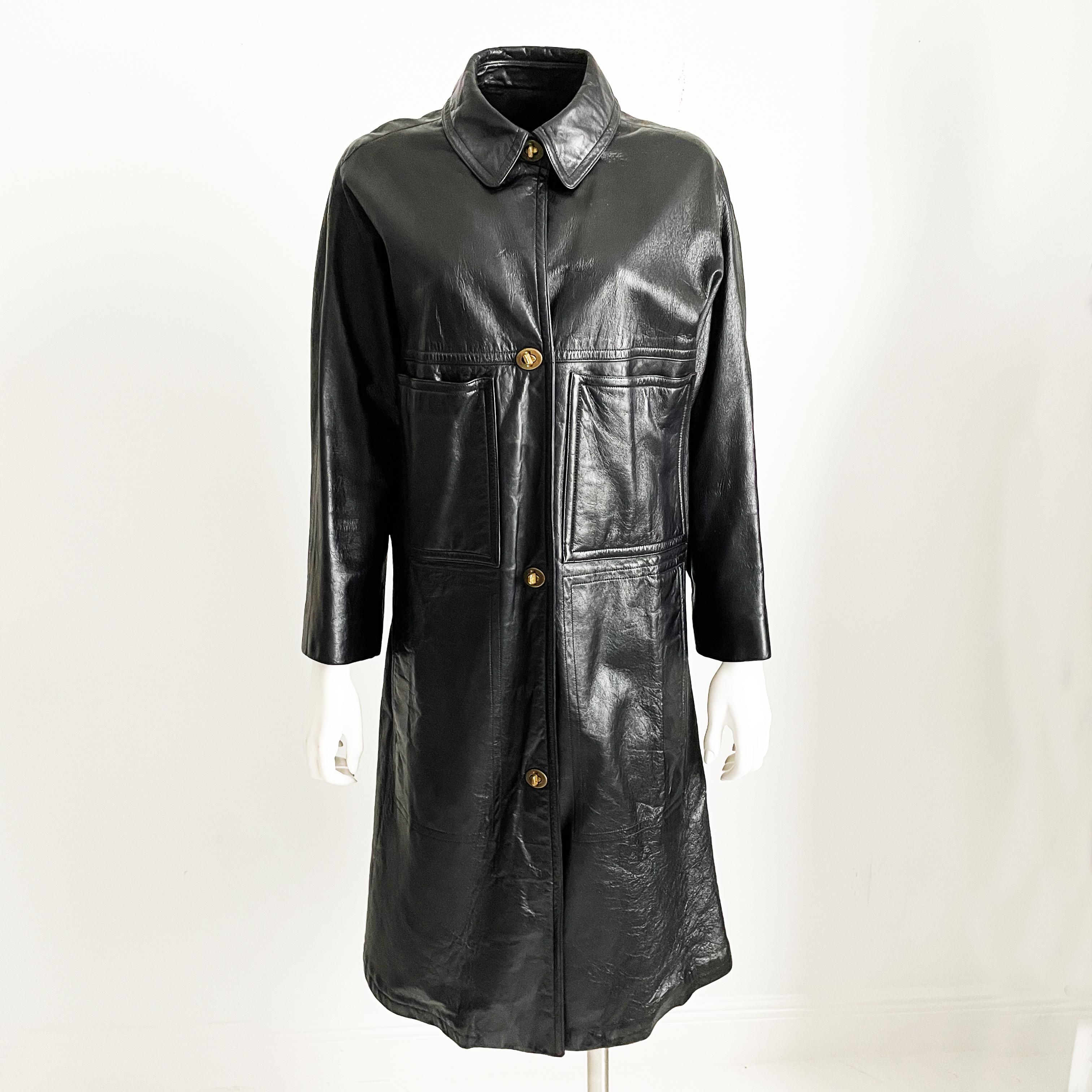 Authentic, preowned, vintage Bonnie Cashin for Sills Black Leather Coat with Turnlock fasteners, circa the mid 60s. Chest & hip pockets/Dolman sleeves/fully-lined/leather clean only. No size tag, fits like modern M: shoulders - 15in, bust - 44in,