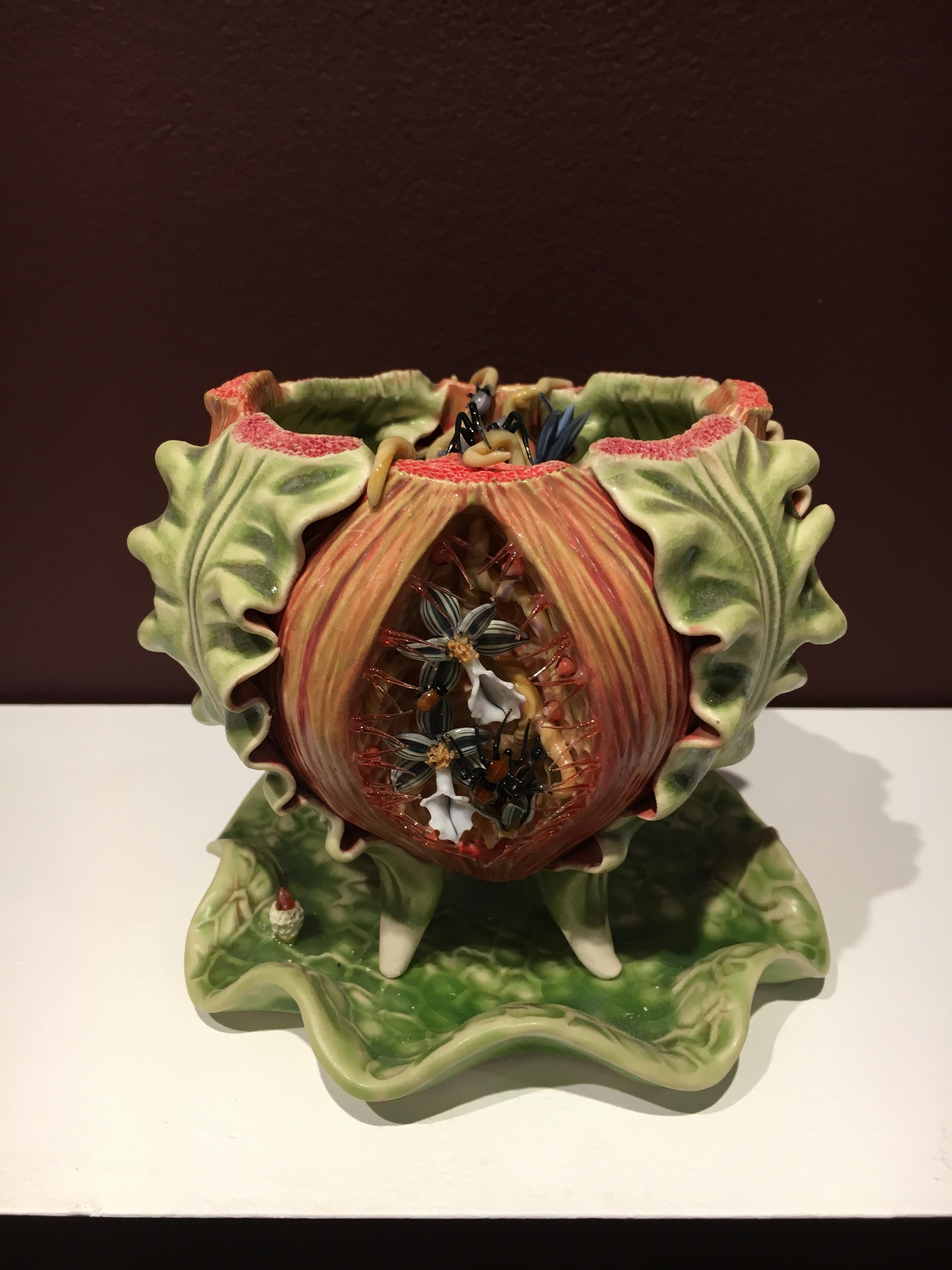 Bonnie Seeman grew up in Miami, Florida with a propensity towards anatomy illustration and the dazzling colors and rich foliage of the Miami landscape.  Developing her technique with porcelain and glass, Seeman channeled her inspirations; resulting