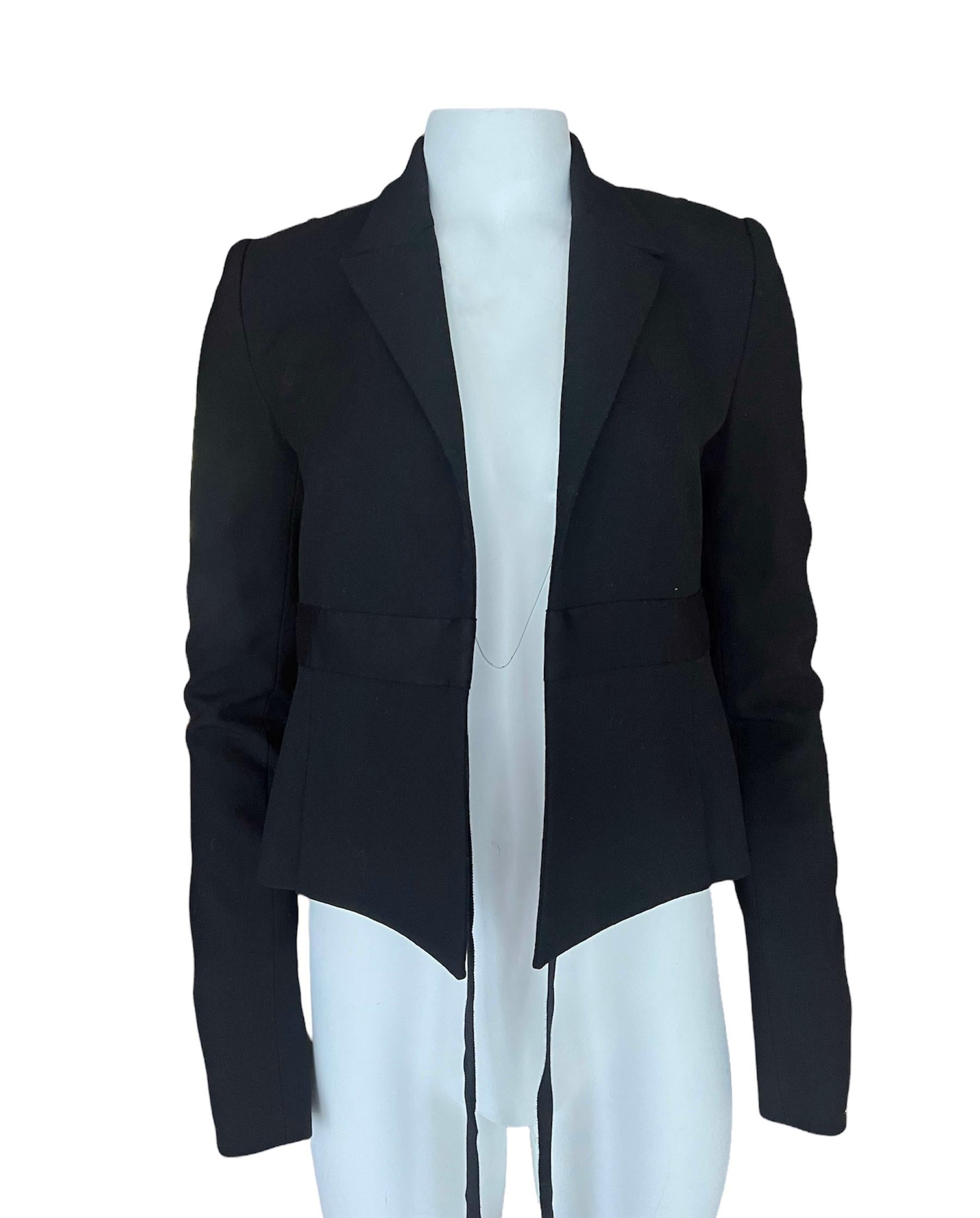 - New, with tags
- The jacket features no closure, collar, slits on the sleeves and on the back.
- Tuxedo style
- 100% wool with 100% silk lining 
- Made in USA
- Est. Retail is $2400
