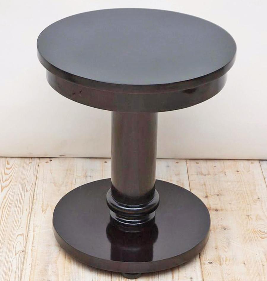 A beautifully crafted custom table in our workshop in the Scandinavian Art Deco Style with round top on cylinder column resting on round base. Constructed from poplar, table has an nitrocellulose lacquer painted finish compounded and the over
