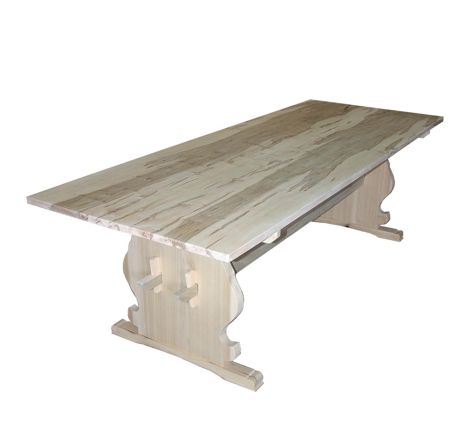 The natural look! We are now making this table in a natural wood finished with a clear acrylic satin sealer to make it user friendly without changing the color.
Great contemporary look. Shown here with a bookmatched figured maple top that is 38