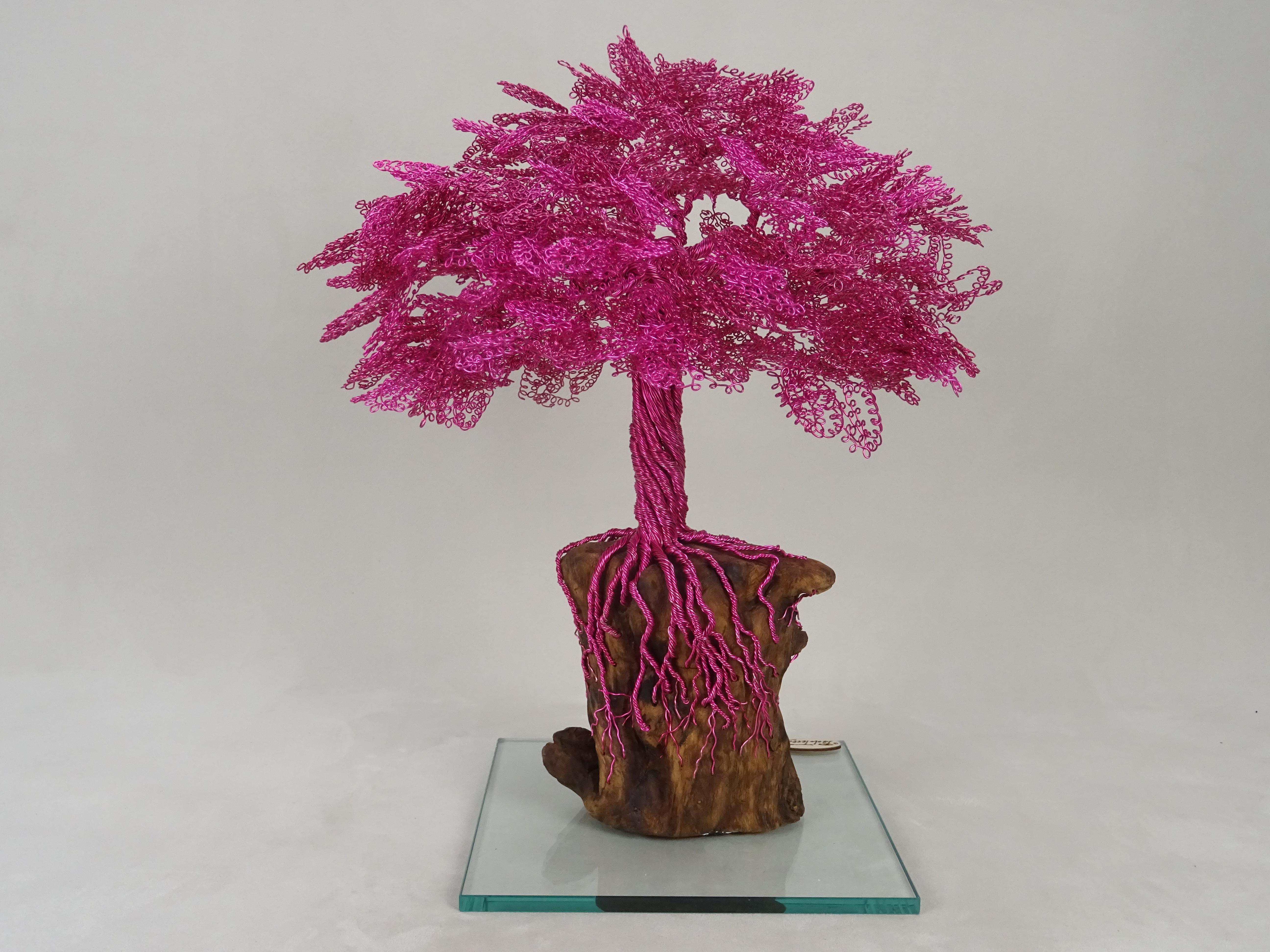 Unique piece sign by the artist.

The Cherry Blossom bonsai is inspired by the beautiful Japanese trees and their flowering. 
The materials are wood and metals, representing both the strength of life and the roots of Mother Nature.
Sculptures are