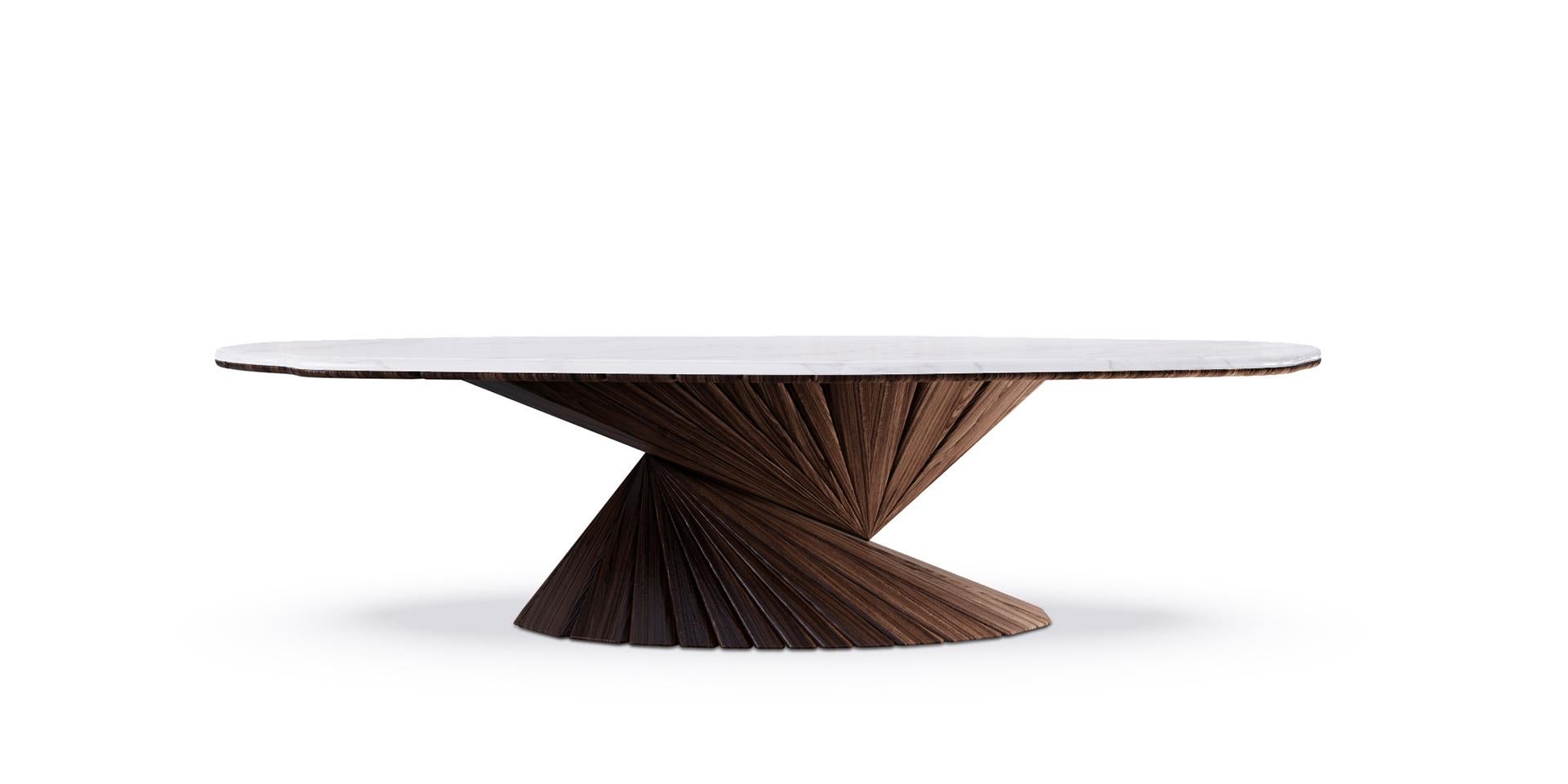 The Bonsai table combines ALMA DE LUCE know how with natural wealth material like walnut wood or Estremoz marble. The walnut wood footer give an unusual and chic effect to this piece that supports a marble and wood top. This luxury statement table
