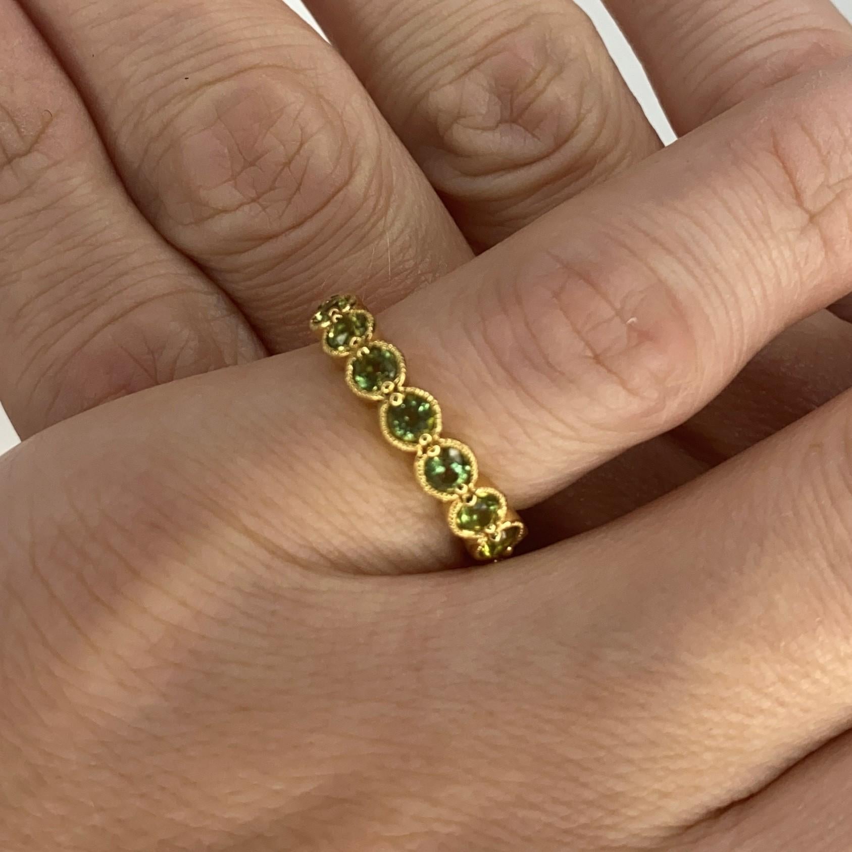 Brilliant Cut Bony Levy Eternity Band Ring in 18Kt Yellow Gold with 2.42 Cts in Green Peridots For Sale