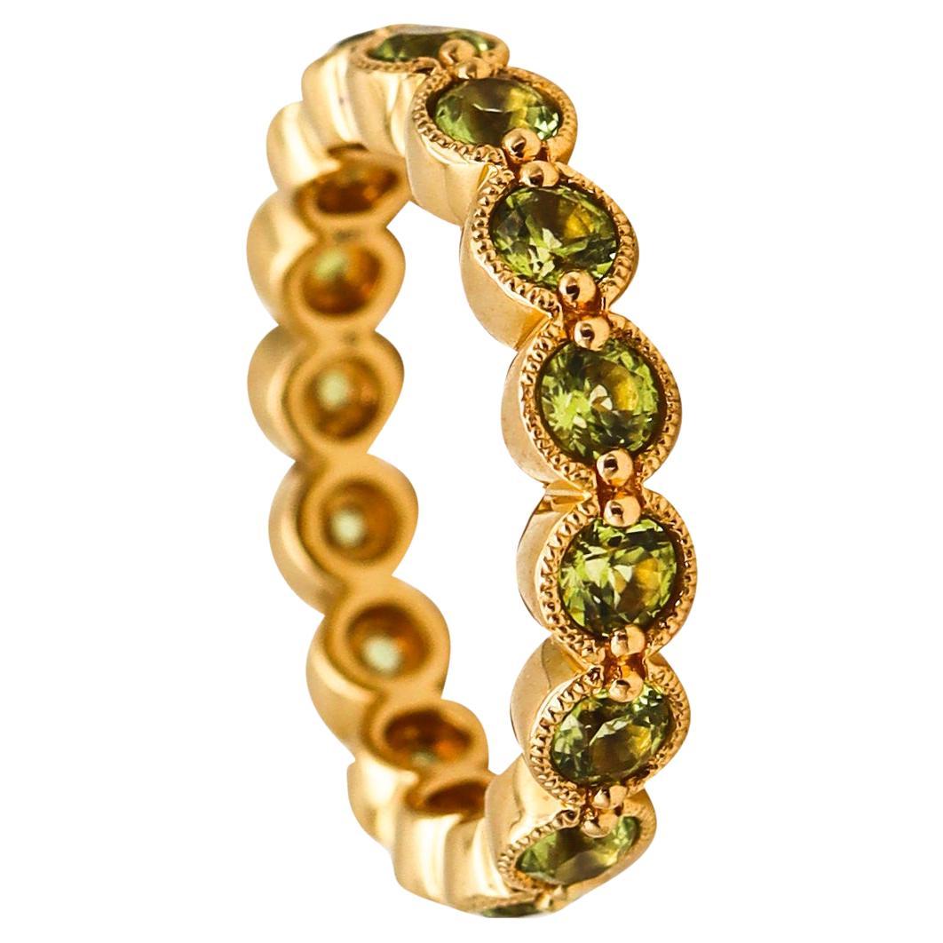 Bony Levy Eternity Band Ring in 18Kt Yellow Gold with 2.42 Cts in Green Peridots For Sale