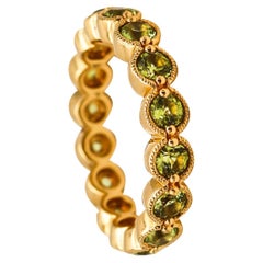 Bony Levy Eternity Band Ring in 18Kt Yellow Gold with 2.42 Cts in Green Peridots