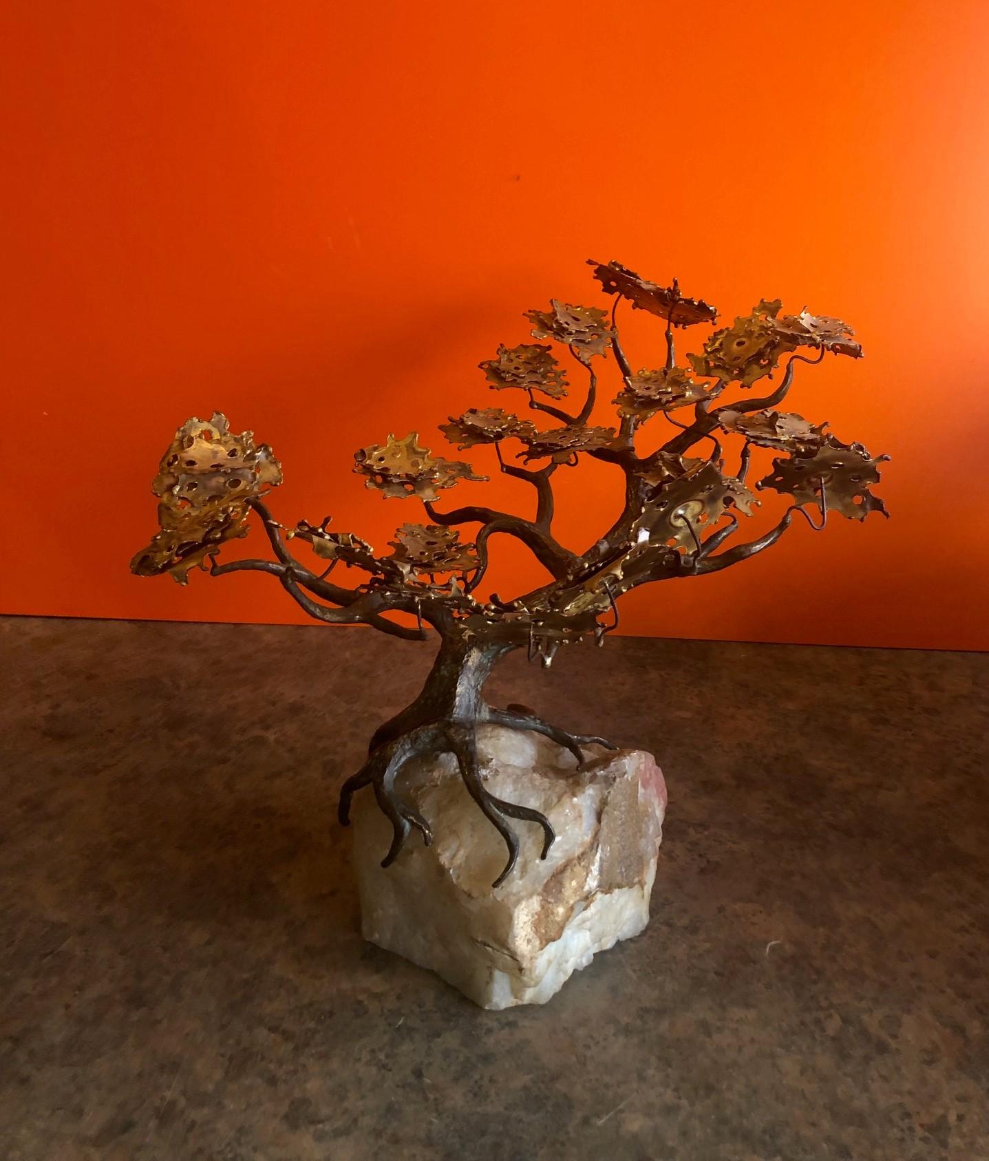 A very cool midcentury bonzai tree sculpture on quartz base by C. Jere for Artisian House, circa 1970s. This modern brutalist tabletop sculpture is made of copper and bronze with stylized gilt leaves on patinated branches and has exposed curving