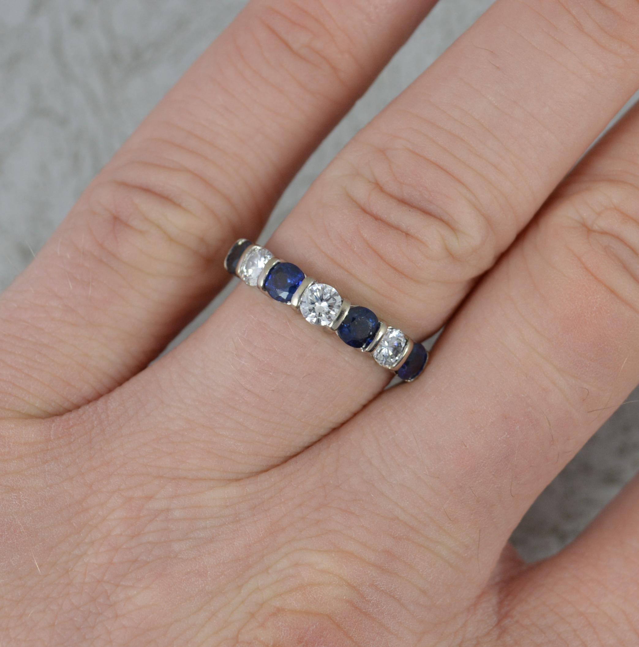 A very fine sapphire and diamond stack ring by Boodles.
Solid 18 carat white gold example.
Set with alternating round brilliant cut diamonds in tension settings. 3.6-3.7mm diameter stones. 0.6ct diamond total. Wonderful, sparkly example.
21mm spread