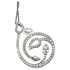 Collana Boodles con ciondolo a spirale traforato in oro bianco 18k con diamanti taglio a pera e rotondi