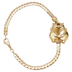 Boodles 18kt. Yellow Gold Bracelet with Bears Holding a Diamond