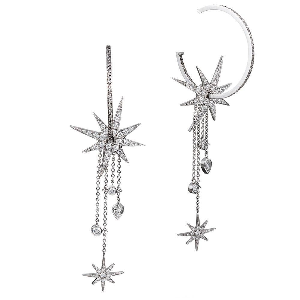 Whimsical, charming and sophisticated earrings from the Boodles Cabaret collection, boasting 271 round brilliant and one pear brilliant white diamonds that weigh approximately 3.00 carats. These earrings consist of an “inside/outside” hoop that