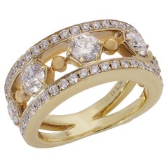 Boodles & Dunthorne 18kt. gold band ring with 1.46 cts of diamonds