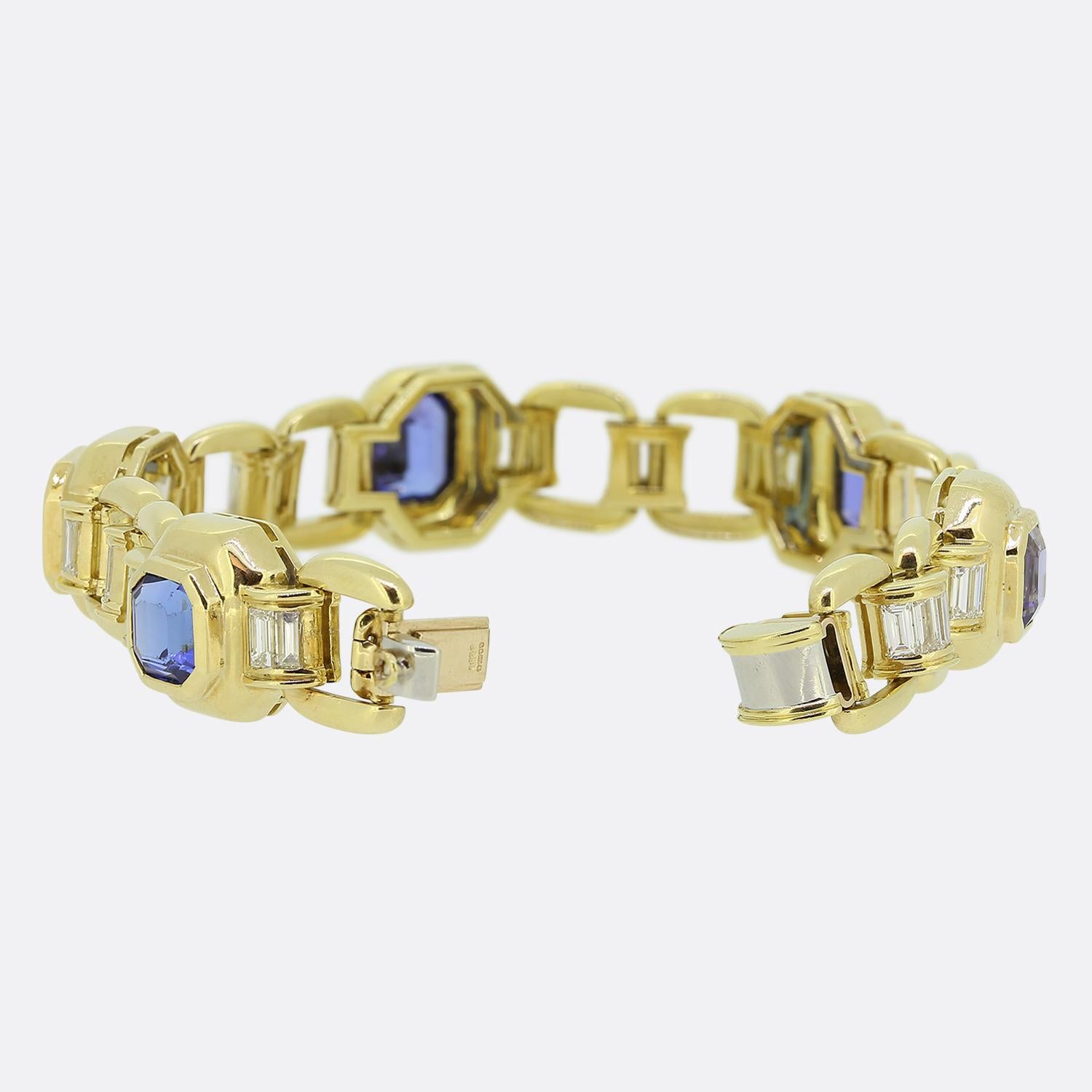 Here we have an outstanding bracelet from the world renowned jewellery designer, Boodles & Dunthorne. This piece has been crafted from 18ct yellow gold and showcases an open structure which plays host to five octagonal links set with octagonal step