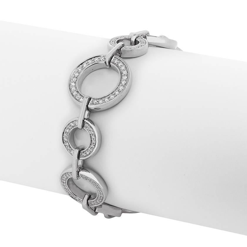 This diamond studded bracelet is by renowned jeweller Boodles. It is part of the Medium Roulette collection which is a twist on the classic eternity ring. The bracelet contains a total of 1.95 carats of grain set diamonds.

The metal is 18 carat