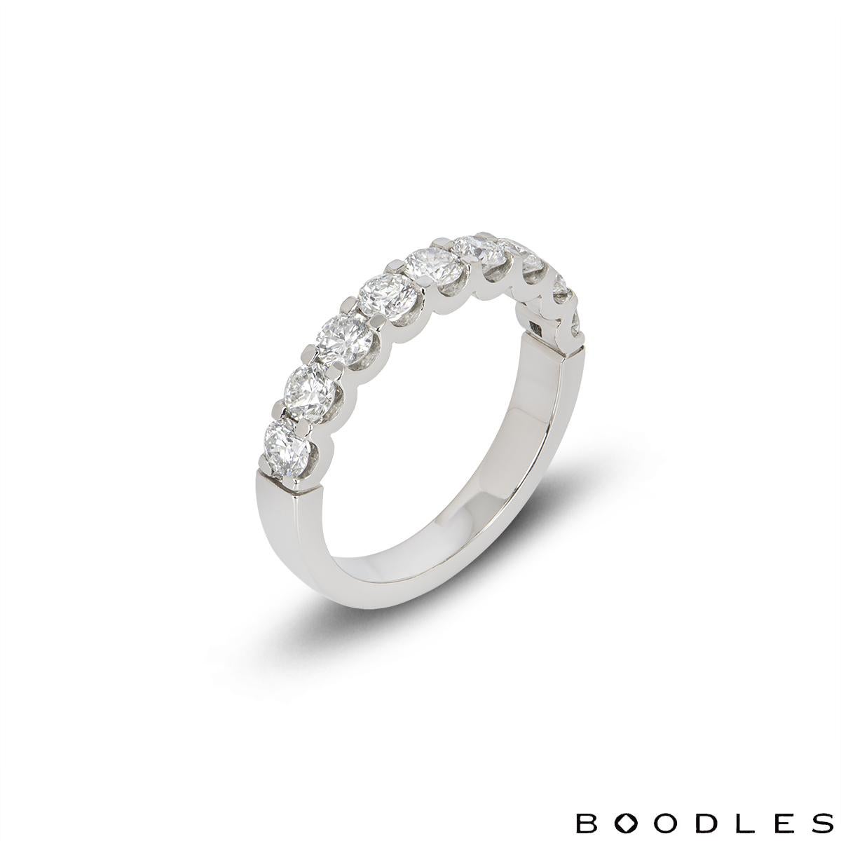 A stunning platinum half eternity diamond ring by Boodles. The ring is set with 9 round brilliant cut diamonds totalling an approximate weight of 1.16ct, E-F colour and VS clarity. The ring measures 3.5mm in width and has a gross weight of 6.4