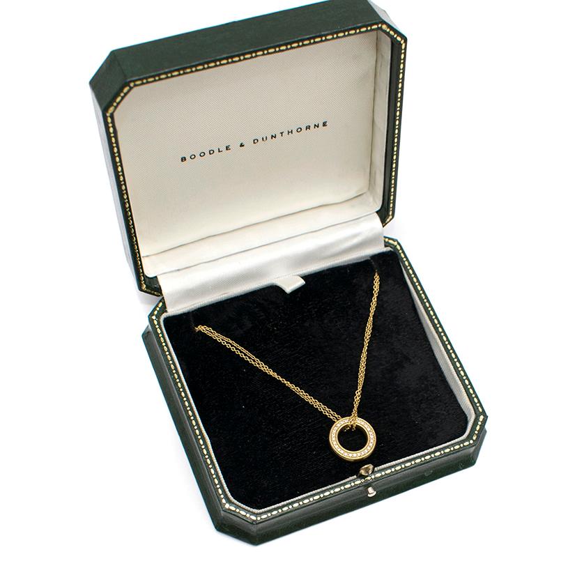 Boodles Small Roulette Yellow Gold Diamond Pendant

- 18k Yellow Gold 
- With 0.35 carats of Round Brilliant Diamonds on both sides of Pendant on a double trace chain.
- Worn as a lucky talisman by many, or as a charming alternative to an eternity