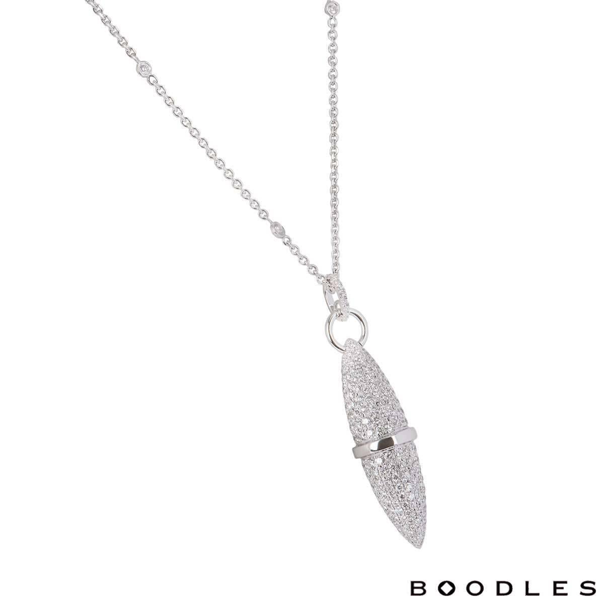 A stunning 18k white gold pendant from the Velocity collection by Boodles. The spindle shaped pendant is pave set with round brilliant cut diamonds and has rubover set diamonds spread throughout the chain. The diamonds have a total weight of 4.60ct,