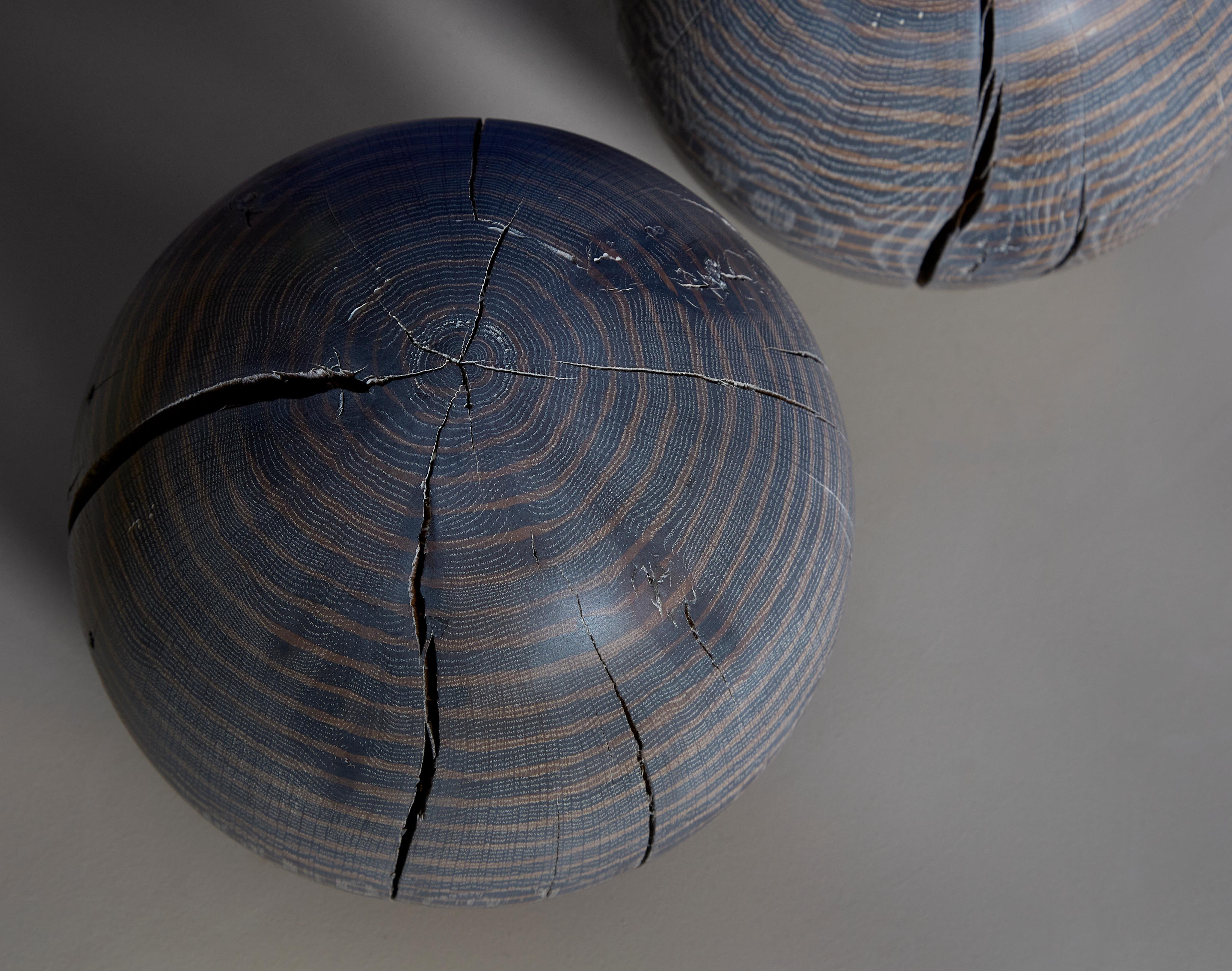 Book bombs by Hamilton Holmes.
Oxalino Collection
2020
Dimensions: 25.4 diameter cm
Materials: White oak.

Perfect spheres turned from single slabs of lumber are given tripod legs to hold up your books and hold down your hearts. These playful