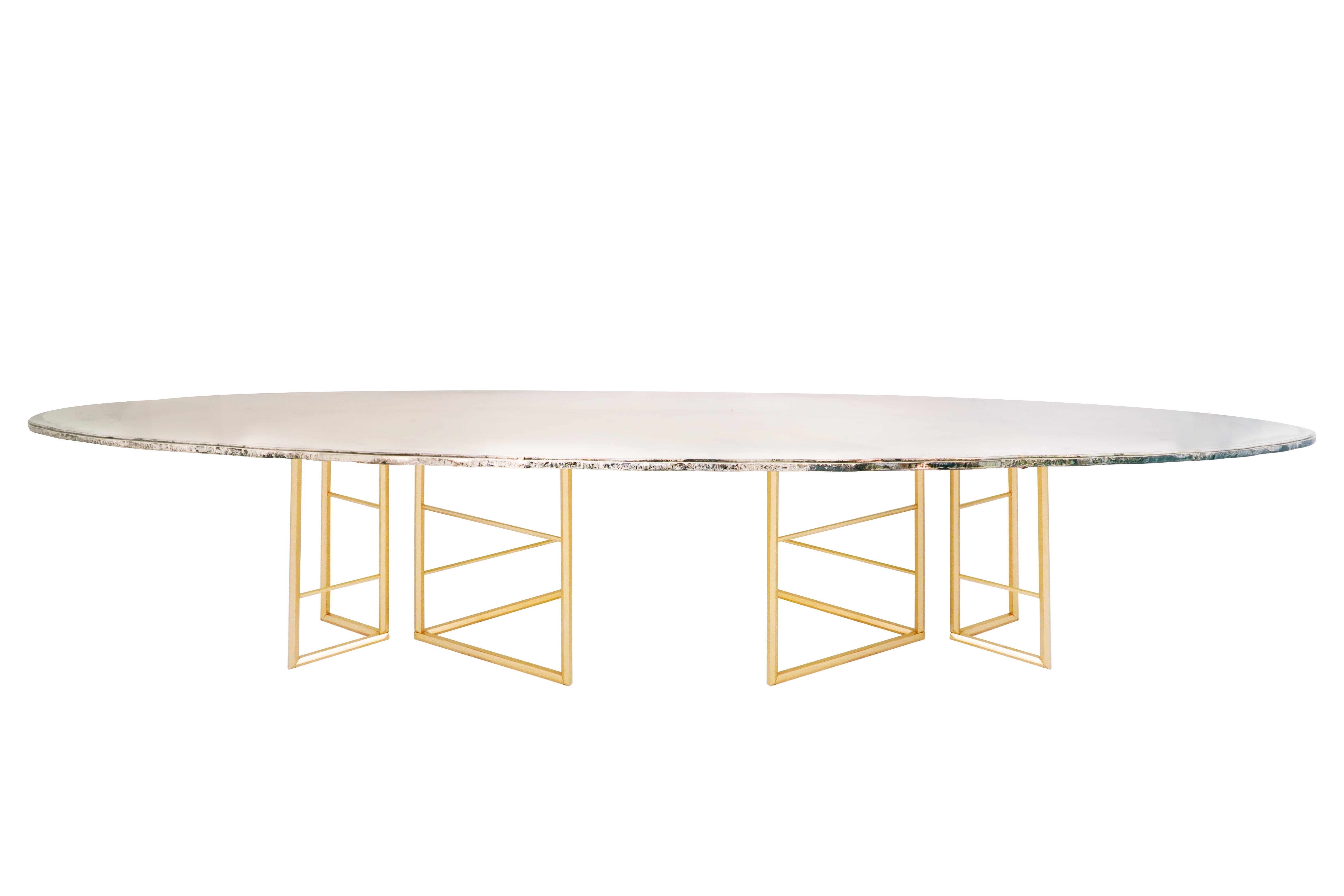 BOOK  

This table is a piece of contemporary art, entirely made by hand in Tuscany, Italy, 100% of Italian origin. 

The table, reminiscent of  pages of an open book raised by a pouff of wind; with its  free-positionable legs  and precious double