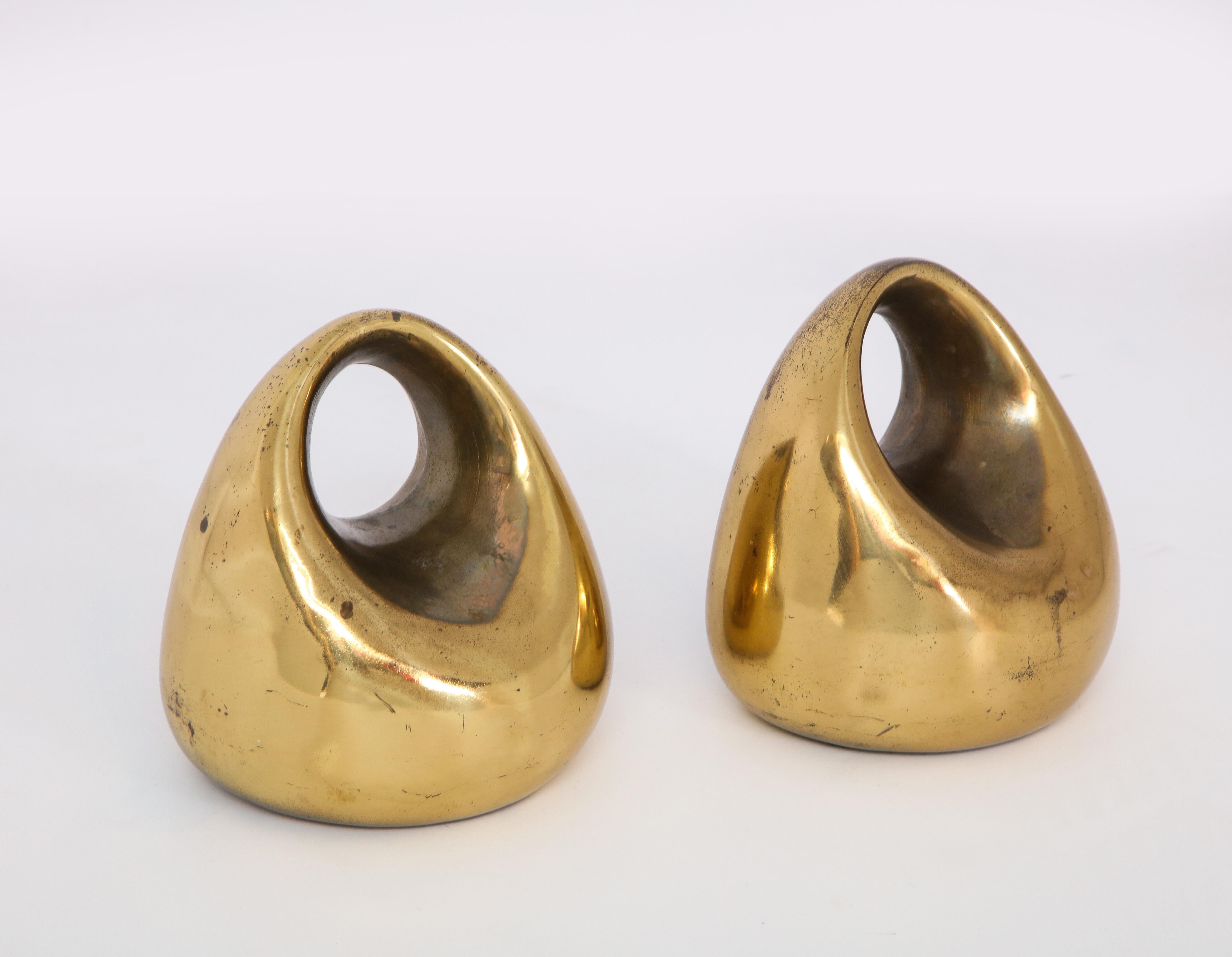 Decorative brass bookends by Ben Seibel for Jenfred-Ware, circa 1960.
