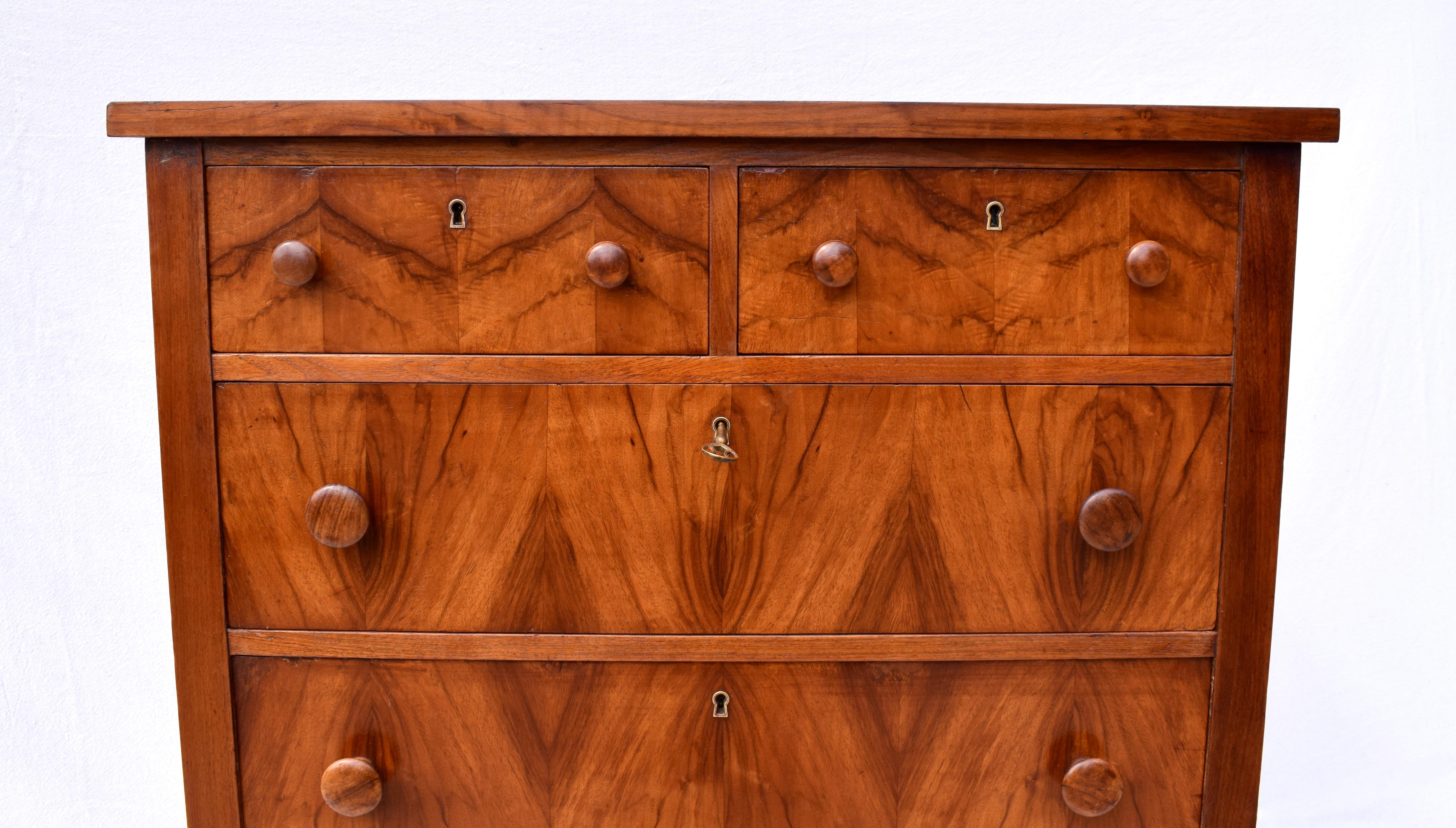 20th Century Book-Matched Flame Mahogany Chest of Drawers on Casters
