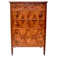 Antique Book-Matched Flame Mahogany Chest of Drawers on Casters