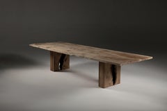 Book-matched pippy Oak table with Inverted Live Edge legs by Jonathan Field