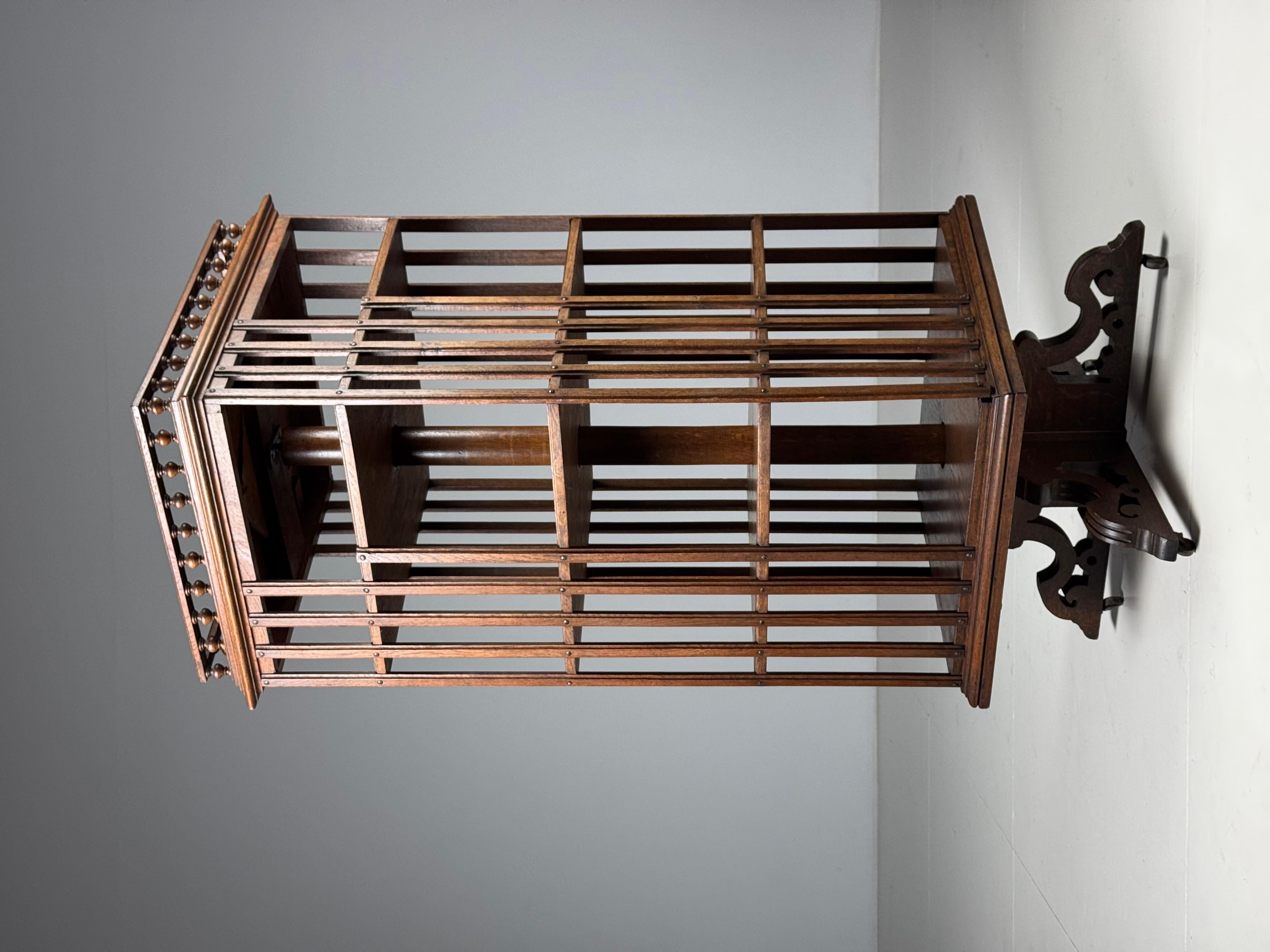 Antique book carousel / bookcase.
From Belgium, circa 1900.

This book carousel rotates smoothly and stands on wheels.

Dimensions: 141H x 56W x 56D cm