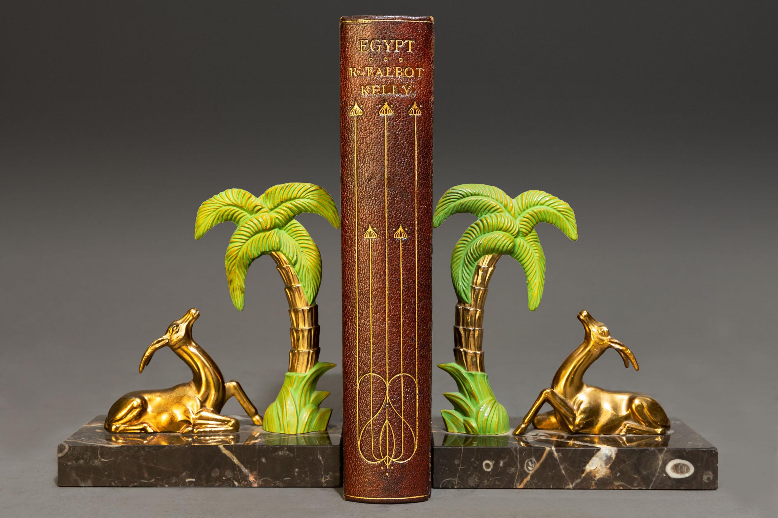 1 Volume. R. Talbot Kelly. Egypt. Painted & Described. Bound in full Wine Morocco with a painted on vellum on the front cover by Cedric Chivers, top edges gilt, gilt on covers & spine, illustrated with colored plates.
Published: London: Adam &