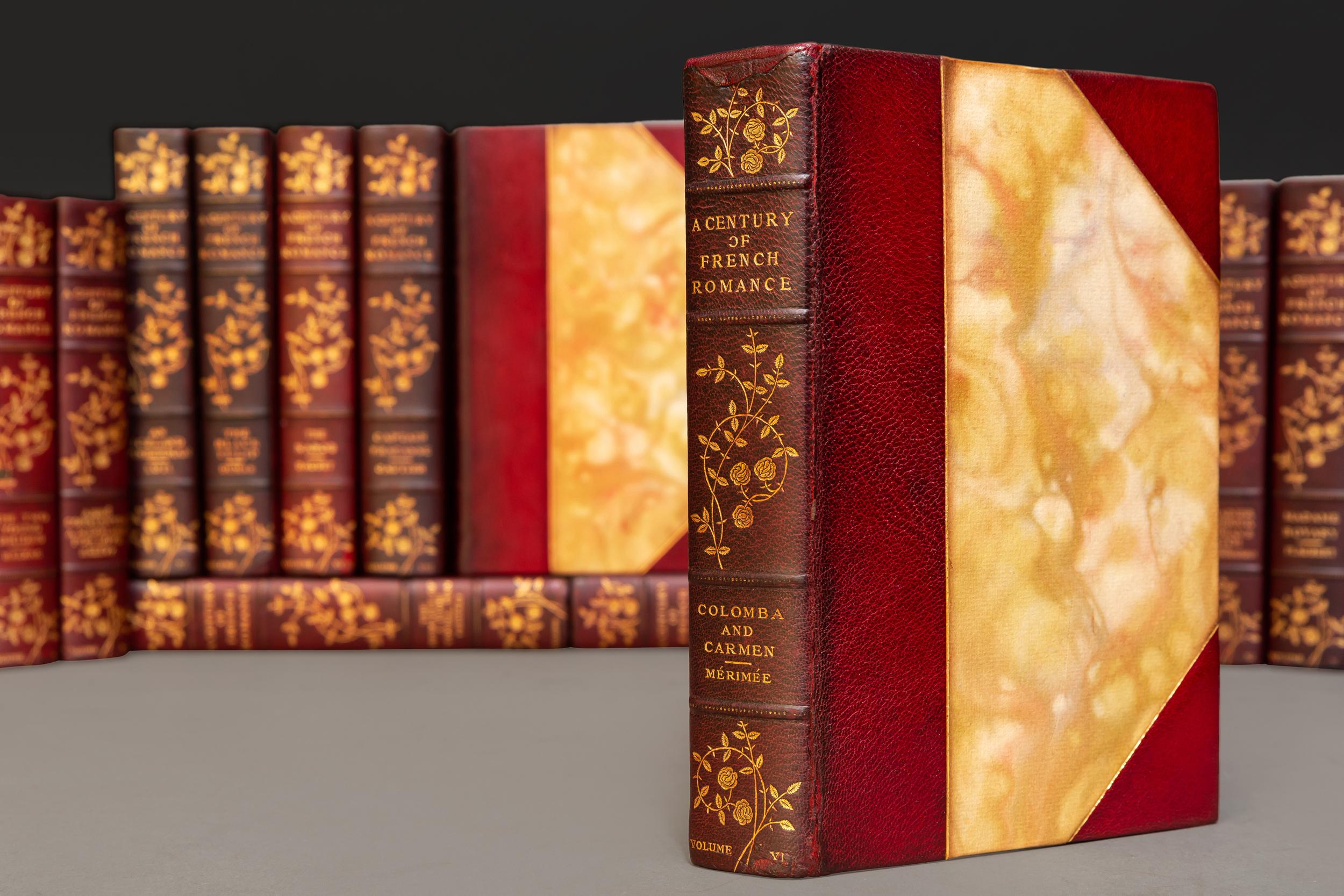 20 Volumes. (Various Authors). A Century of French Romance. Bound in 3/4 red morocco. Marbled boards, marbled endpapers, top edges gilt, raised bands, floral gilt on spines. Illustrated with watercolors, photogravure, portraits by Octave Uzanne.