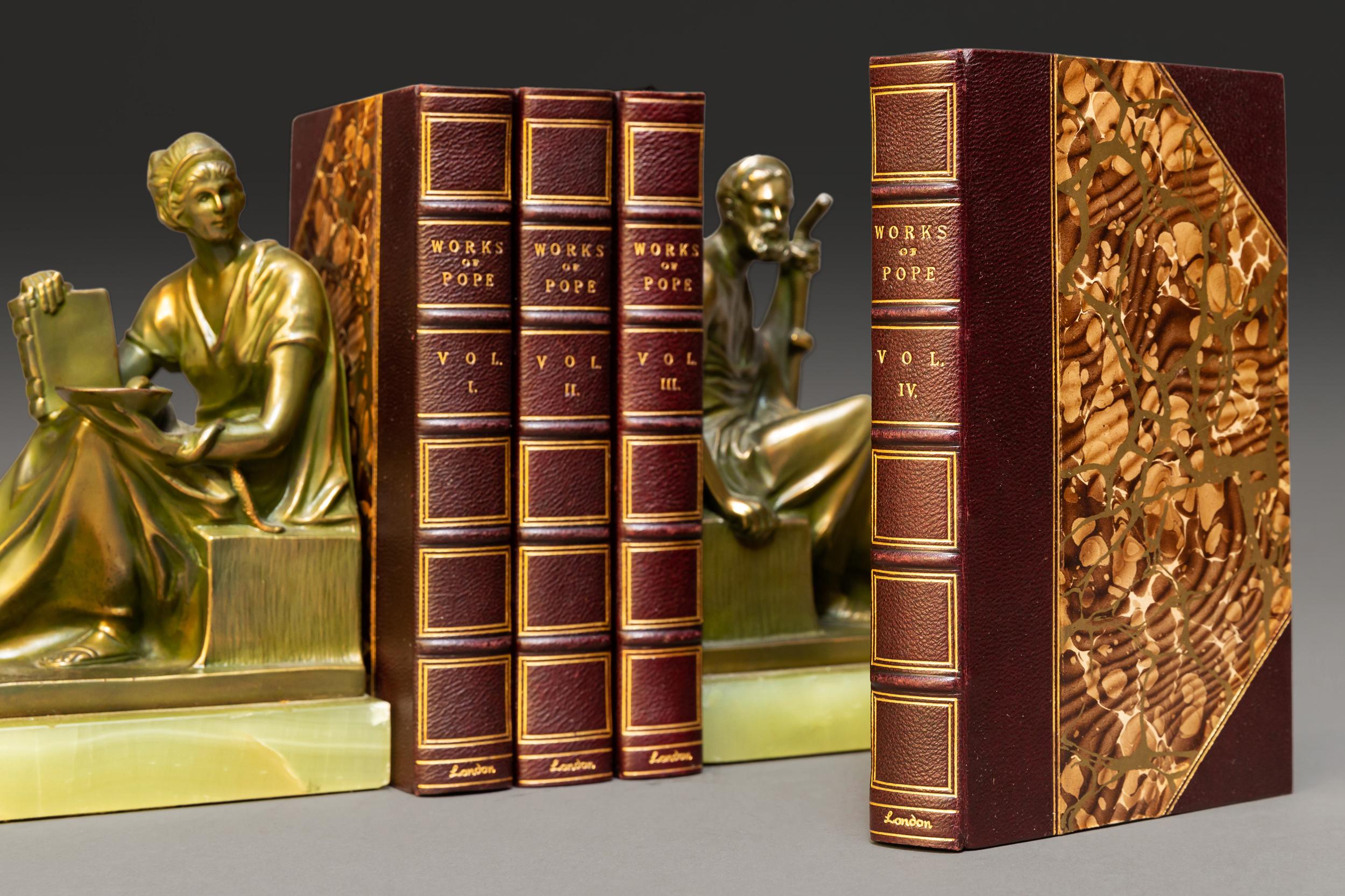 4 Volumes. Alexander Pope. The Works and memoirs. With notes & notices by Rev. G. Croly. With frontispieces. Bound in 3/4 black morocco. Marbled boards, marbled endpapers, gilt on spines & covers, raised bands, top edges gilt. 
Published: London: