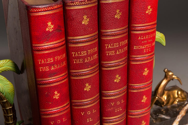 4 Volumes. (Various Authors). Tales From The Arabic. Of The Breslau & Calcutta (1814-18) Editions. Translated by John Payne. Bound in 3/4 red morocco with marbled boards. Gilt on covers & spines, raised bands, marbled endpapers, top edges gilt.