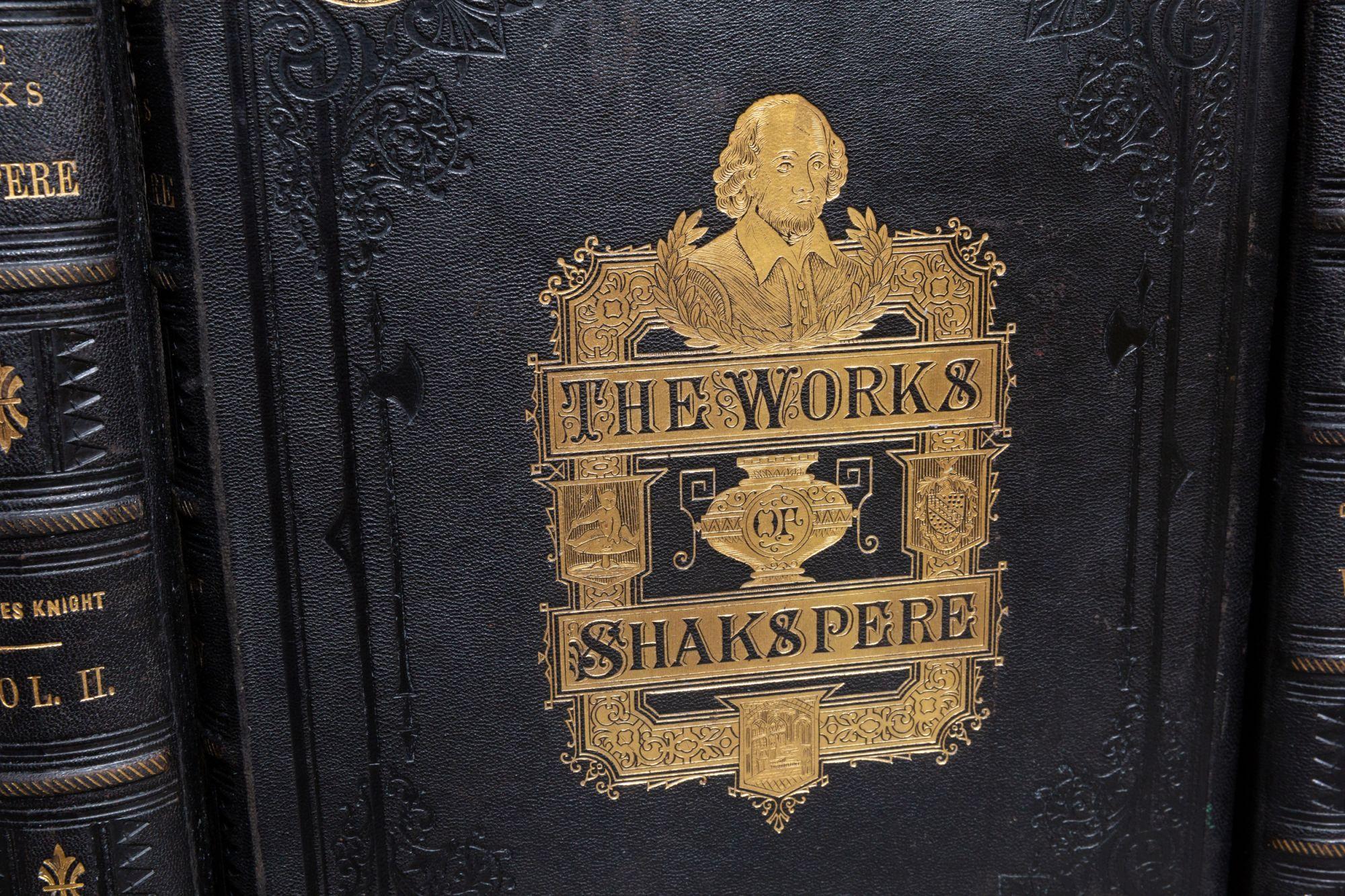 4 Volumes. William Shakespeare. The Complete Works. Edited by Charles Knight. Imperial Edition. Bound in full black morocco by N. D. MacDonald & Co. Ornate gilt designs of Shakespeare on covers with gilt on spines. Raised bands, inner dentelles, all
