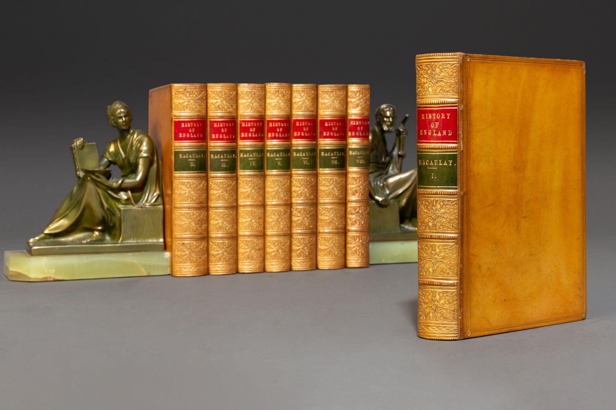8 Volumes. Lord Macaulay. The History of England. From the Accession of James the Second. With handwritten notes in endpapers. Bound in full tan calf. Ornate gilt on covers & spines. Red & green labels, raised bands, marbled endpapers, marbled