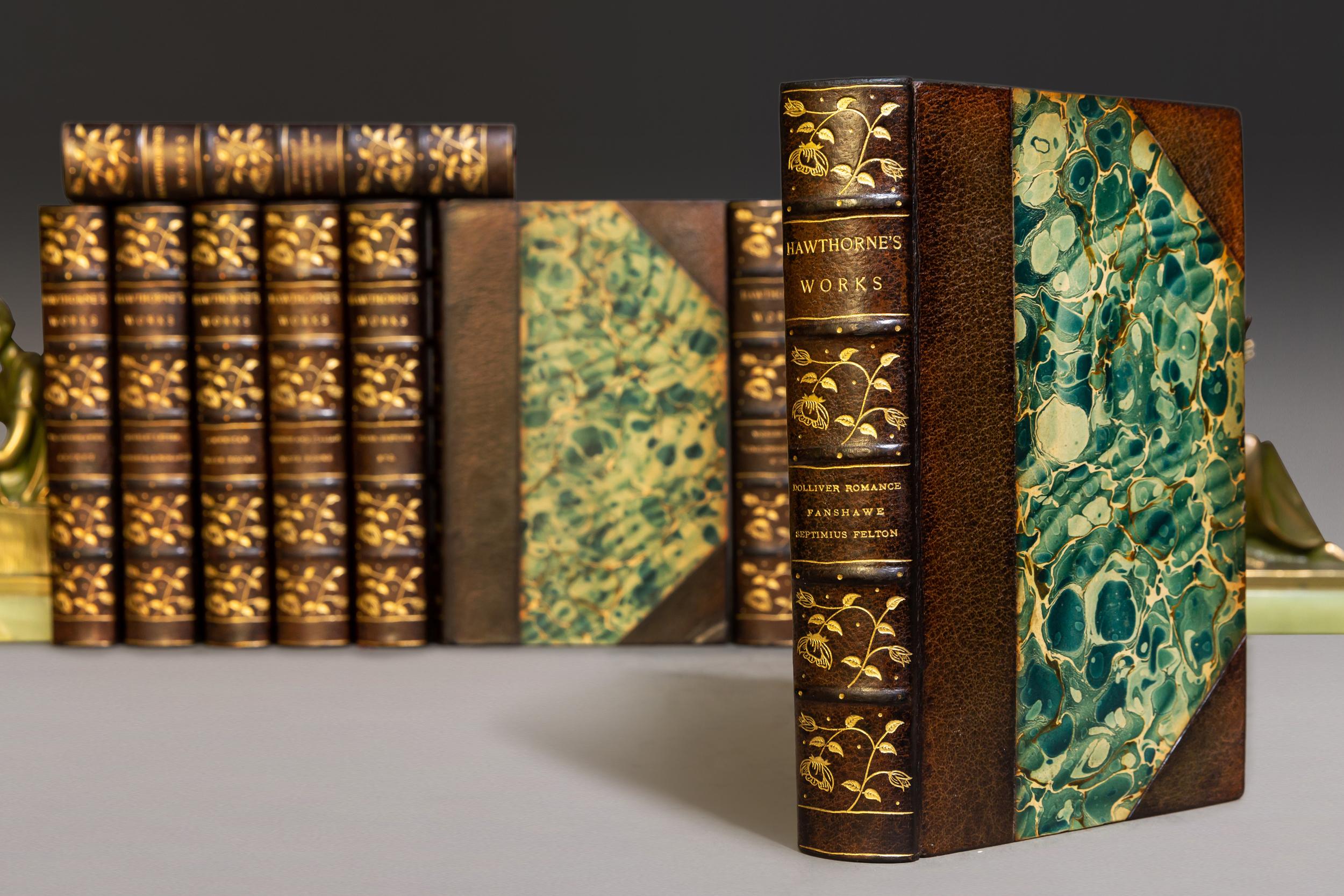 (Book Sets). 13 Volumes. Nathaniel Hawthorne. Complete Works. Illustrated With Etchings By Blum,
Church, Dielman Etc. Bound in 3/4 Brown Morocco By Blackwell, Marbled Boards, marbled endpapers,
top edges gilt, raised bands, ornate gilt on spines.