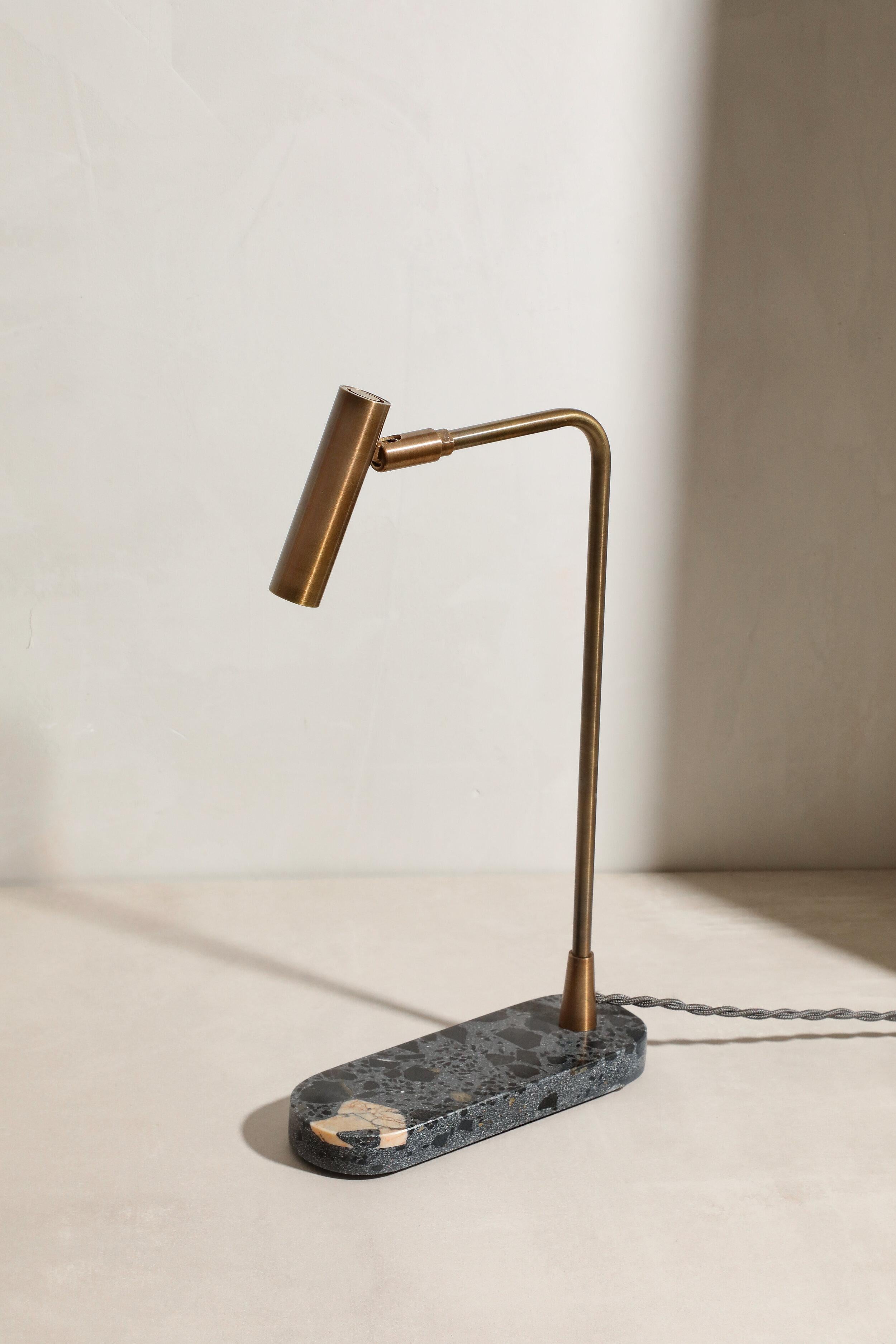 Book table lamp by Contain.
Dimensions: D 7 x W 33 x H 20.5 cm (standard length).
Materials: brass structure and stone base.
Available in different finishes.

All our lamps can be wired according to each country. If sold to the USA it will be