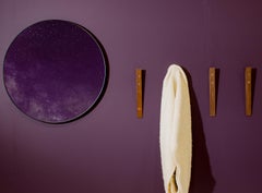 Gancio a muro per libri