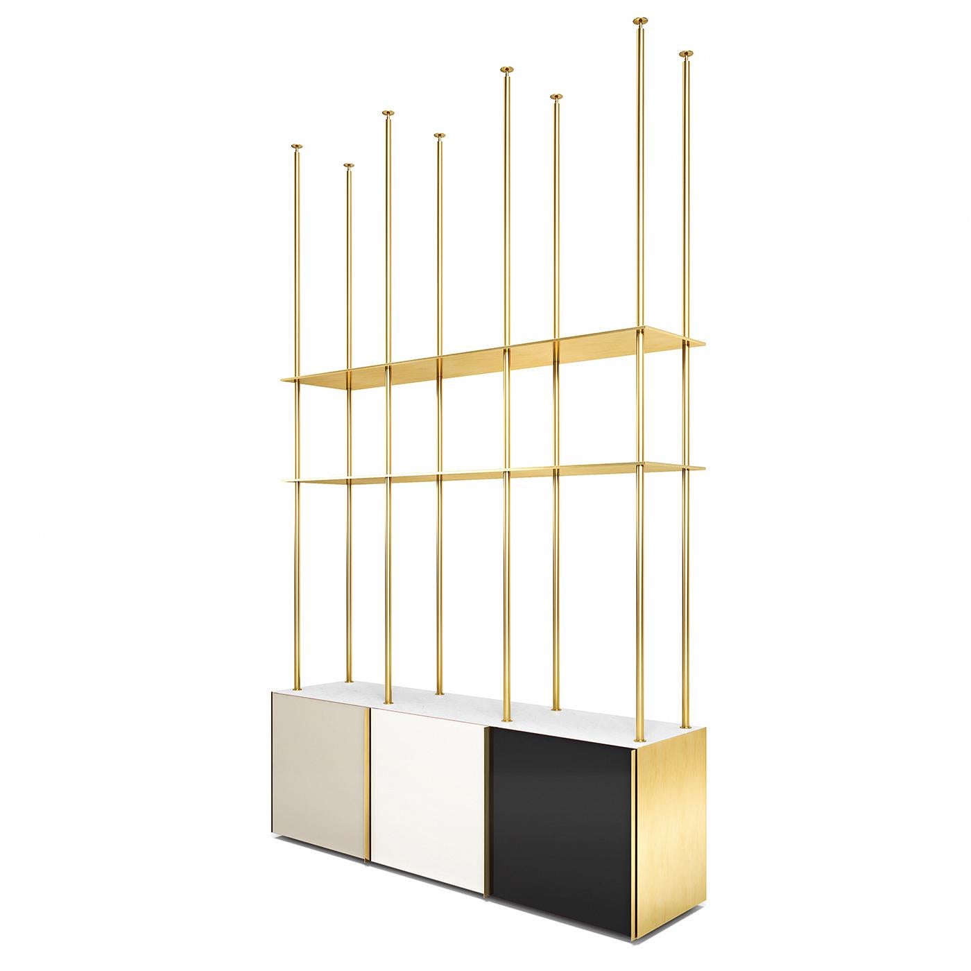 Equally stunning as a room divider or to simply keep books organized, this floor-to-ceiling bookcase is a custom-made piece whose height is determined by the customer's ceiling. The lightweight shelving unit in glossy brass stems from a 3-door