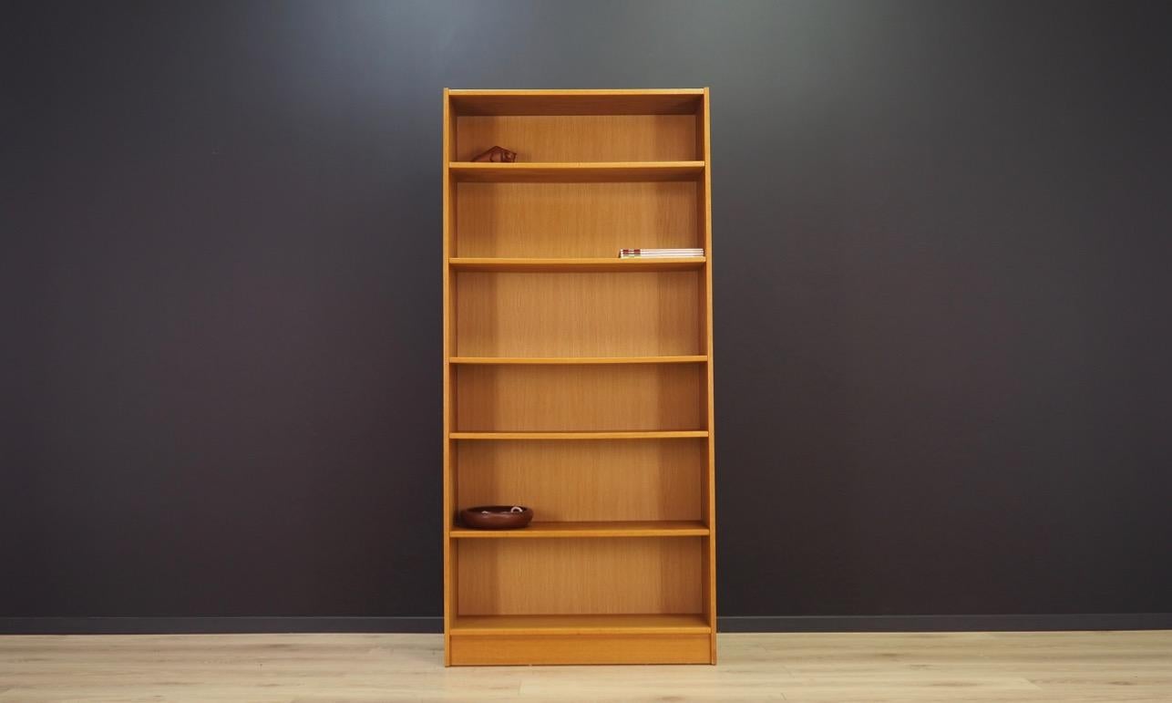 Superb bookcase - library from the 1960s-1970s. Scandinavian design, Minimalist form. Furniture finished with ash veneer. Shelves with adjustable height. Maintained in good condition (minor bruises and scratches, filled veneer cavities) - directly