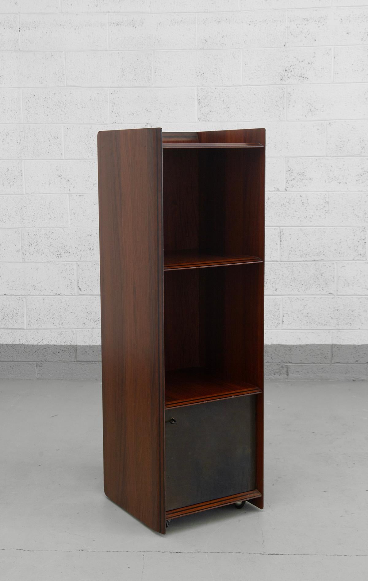 A masterpiece of Italian 1970s design, this exceptional “Artona” tall center cabinet was designed by the celebrated duo Afra and Tobia Scarpa and produced by Maxalto in 1975. A rare and fully original example from the iconic Artona series, this
