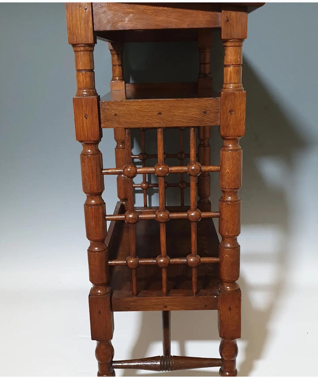 This is a very fine studio Arts and Crafts bookcase by Leonard Wyburg for Libertys of London . The piece is in exceptional condition and versatile. 
Created from sturdy English Oak and will date from the Arts and Crafts period of the early 1900's.