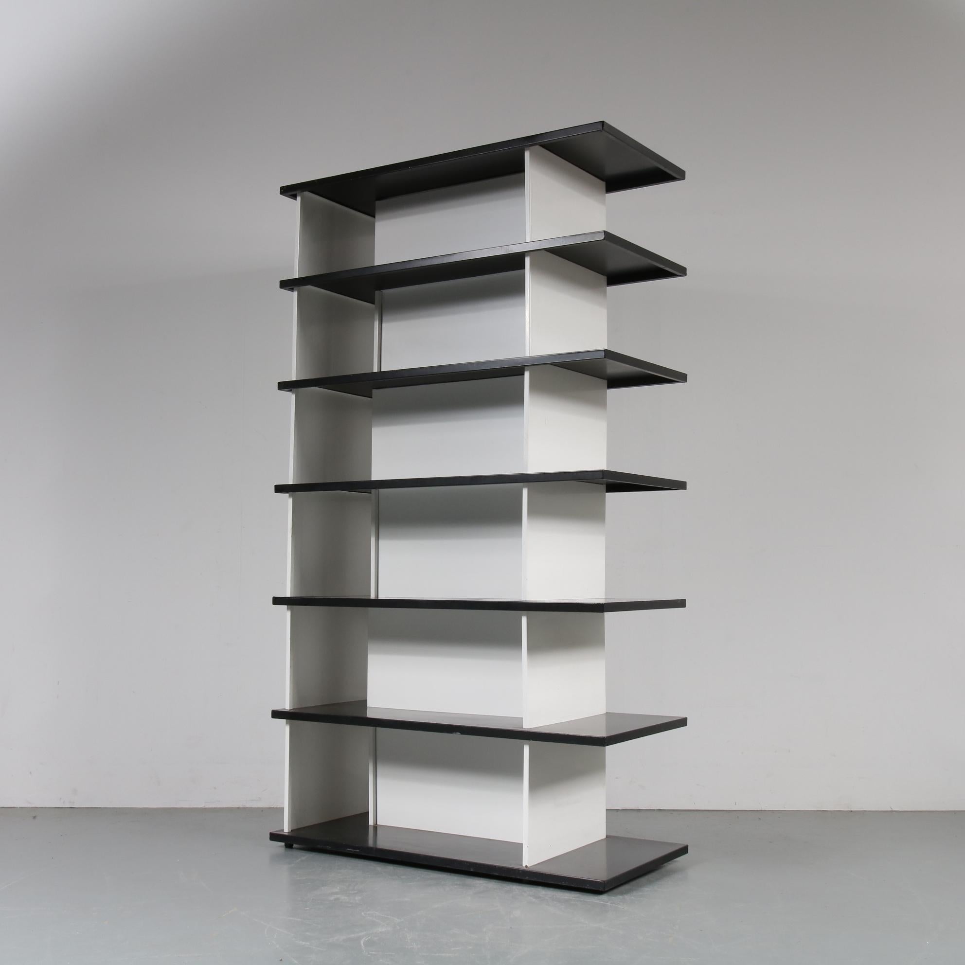 Stunning bookcase by Wim Rietveld, manufactured by De Bijenkorf in the Netherlands, circa 1950.

This unique piece was made by Wim Rietveld in commission for Dutch department store De Bijenkorf. It is entirely made of folded sheet steel, giving it
