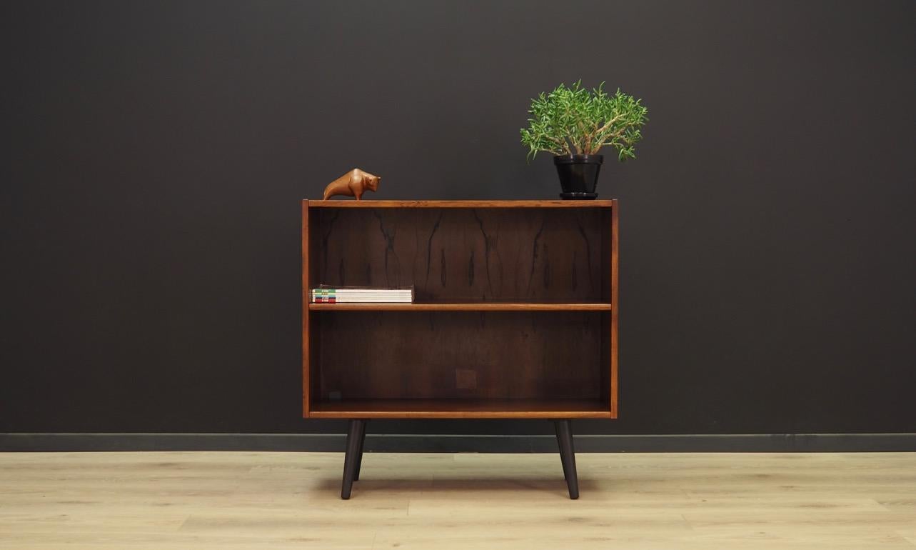 Classic bookcase from the 1960s-1970s, Minimalist form, Danish design. Surface of the furniture finished with rosewood veneer. Shelf with adjustable height. Maintained in good condition (minor bruises and scratches) - directly for