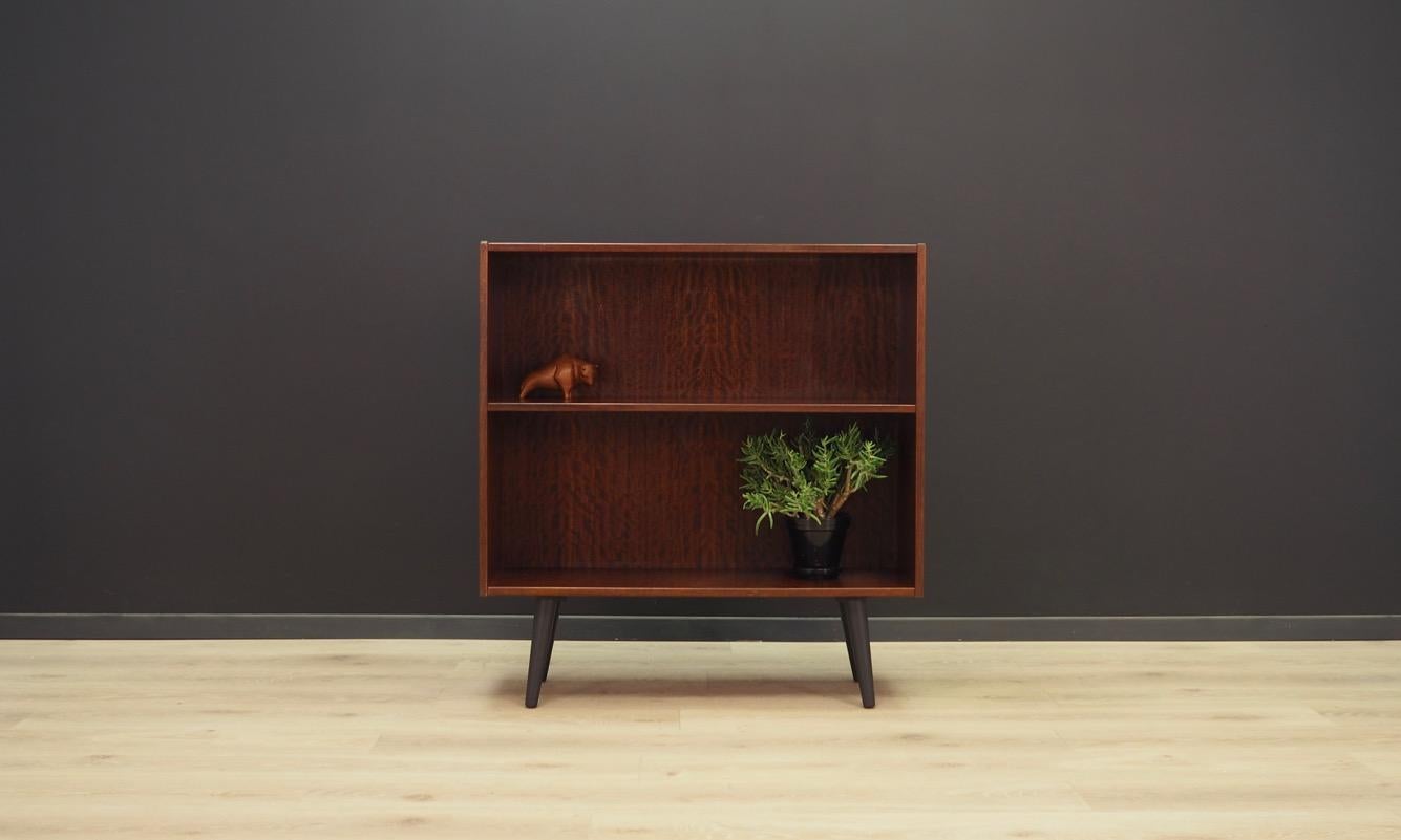 Classic bookcase, library from the 1960s-1970s, Scandinavian design, minimalistic form. Furniture finished with rosewood veneer. Maintained in good condition (minor bruises and scratches), directly to use.

Dimensions: height 95 cm, width 90 cm,