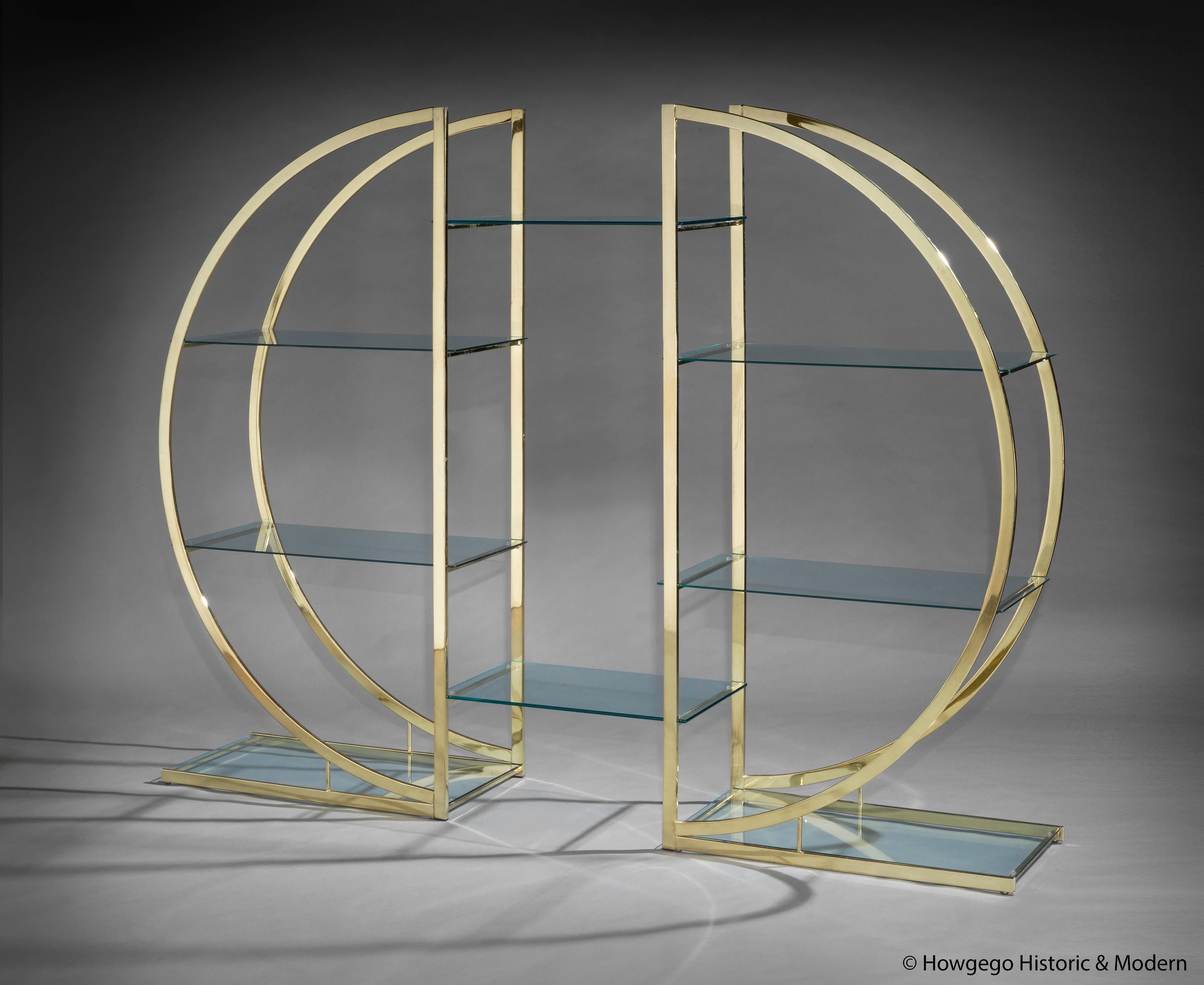 Classical elegance, Mid-Century Modern brass & glass bookcase or display piece evoking Art Deco designs
Versatile can be used as one large bookcase or two small bookcases

If used as a single piece the top and bottom shelves bridges both