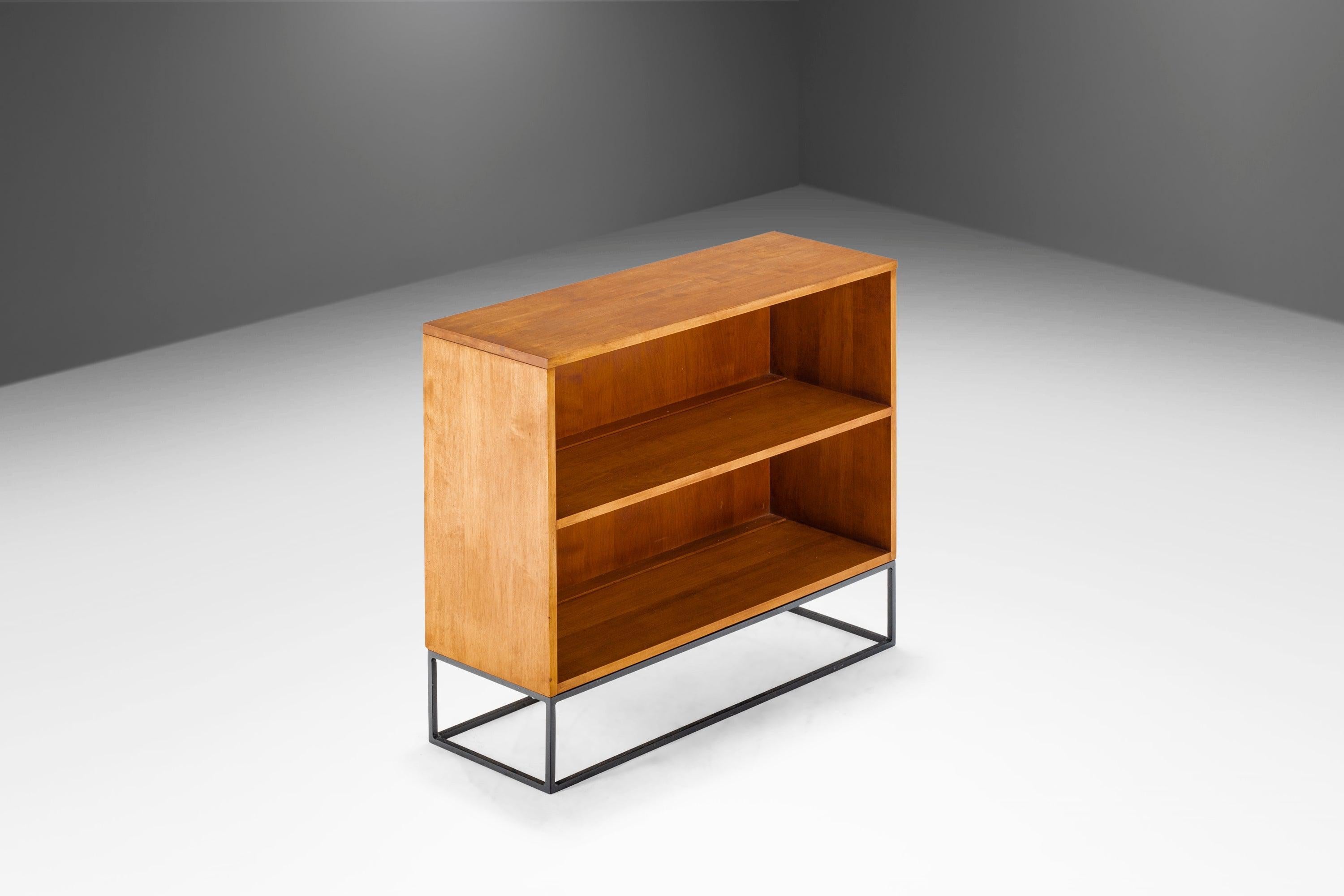 This one of a kind book shelf is the perfect combination of classic design with a modern twist. Designed by the visionary Paul McCobb and produced by the Planner Group this book shelf has recently undergone a transformative transition from simple