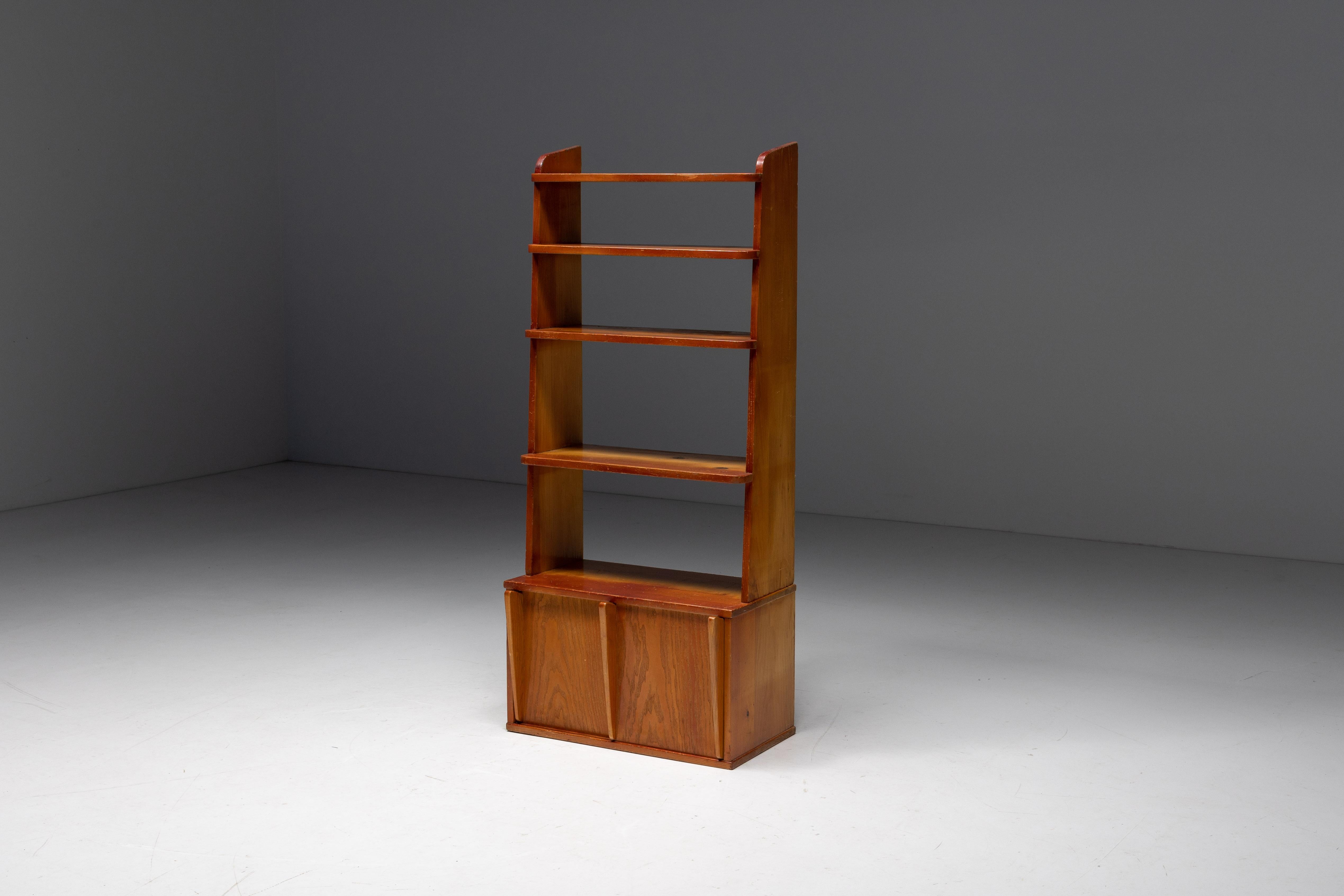 description:Charlotte Perriand; Minimalist; Mid-Century Modern; Bookcase; Book Cabinet; Room Divider; Teak; 

Bookcase in the unmistakable style of Charlotte Perriand in a warm, fine teak color. This timeless piece of furniture features a closed
