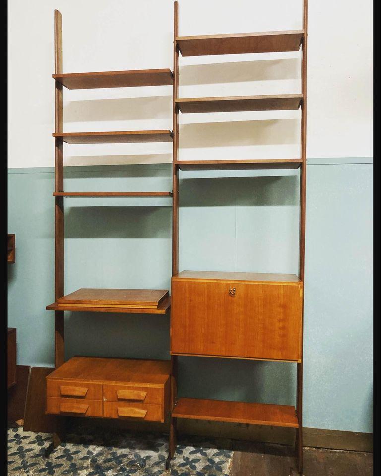 Bookcase by Isa Bergamo Italy 1960s 
The bookcase is self-supporting it can be mounted on the wall or centrally as a divider made up of two sections with drawer tops and doors.
La libreria è versatile , cioè può stare in qualsiasi tipo di stanza e