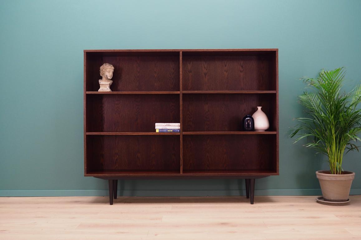 Sensational bookcase - library from the 1960s-1970s. Scandinavian design, Minimalist form. The surface of the furniture finished with rosewood veneer. Shelves with adjustable height. Preserved in good condition (small bruises and scratches) -