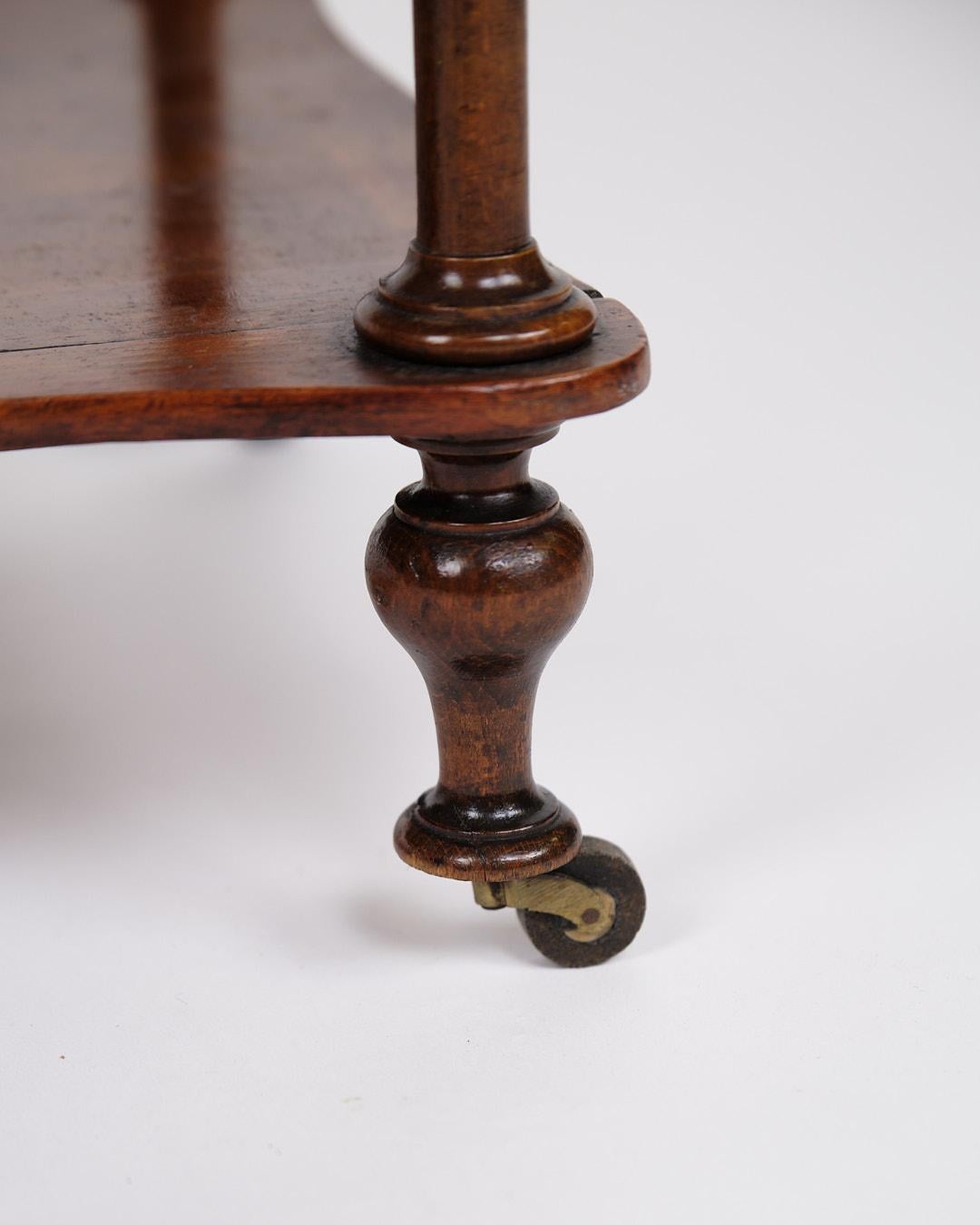 Inizio XX secolo Libreria/Scaffale con 3 ripiani e ruote in mogano in vendita